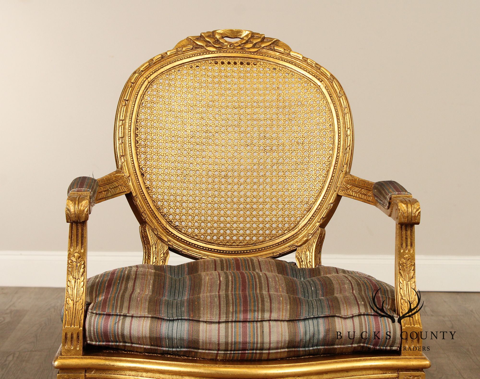 Decorative Crafts, Inc. Pair of French Louis XVI Style Caned Giltwood Fauteuil Armchairs