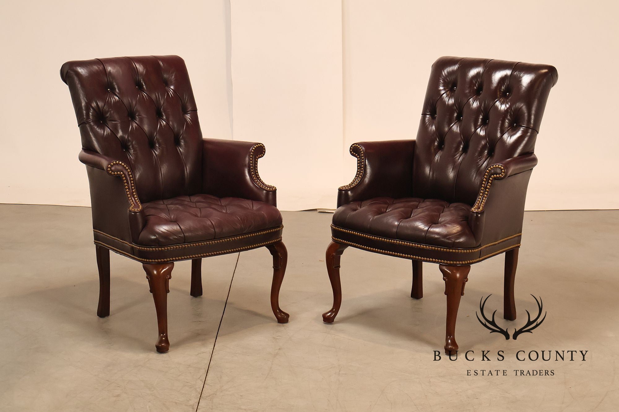Hancock & Moore Pair of Tufted Leather and Mahogany Armchairs