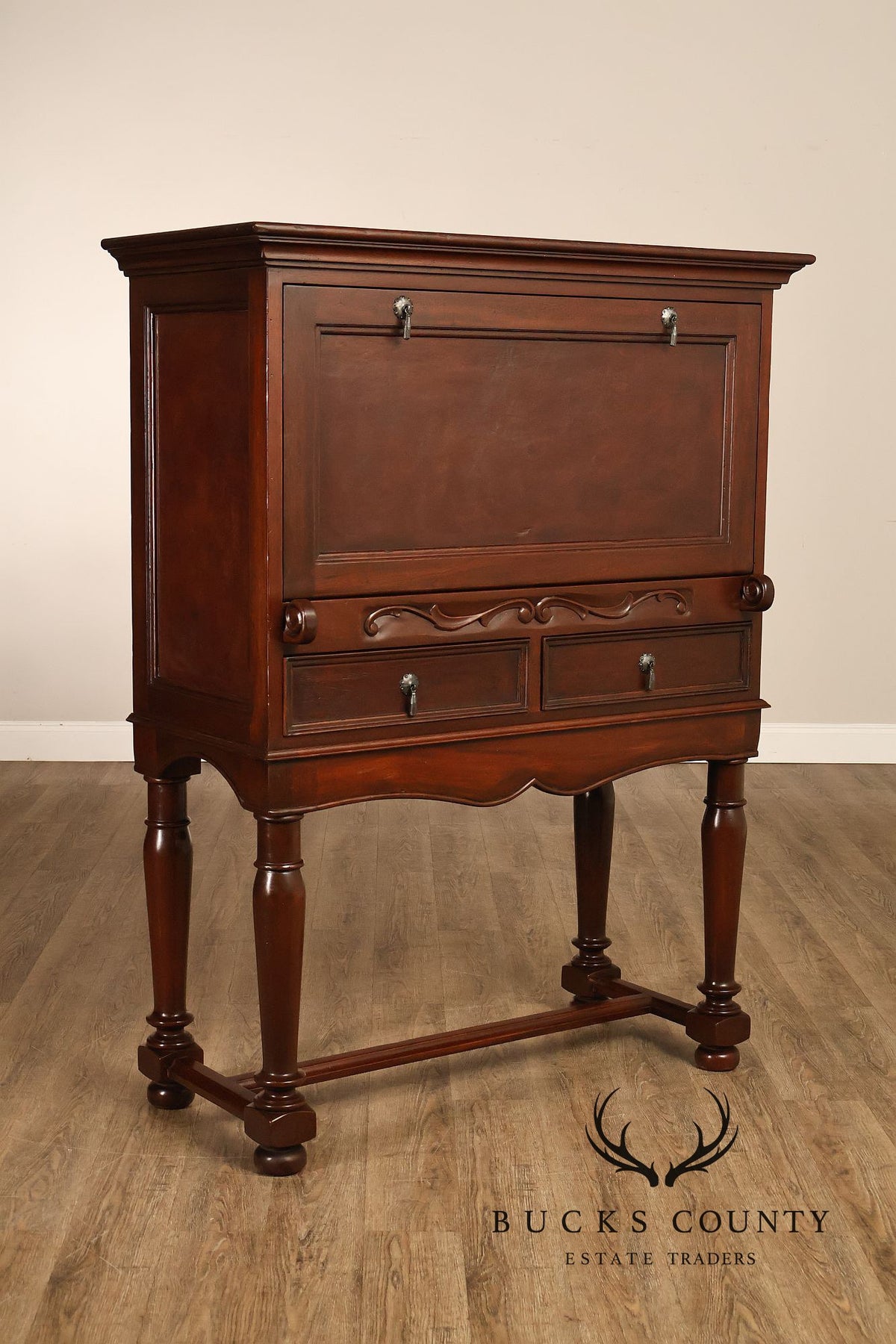 Traditional English Style Drop Front Bar Cabinet With A Stretcher Base