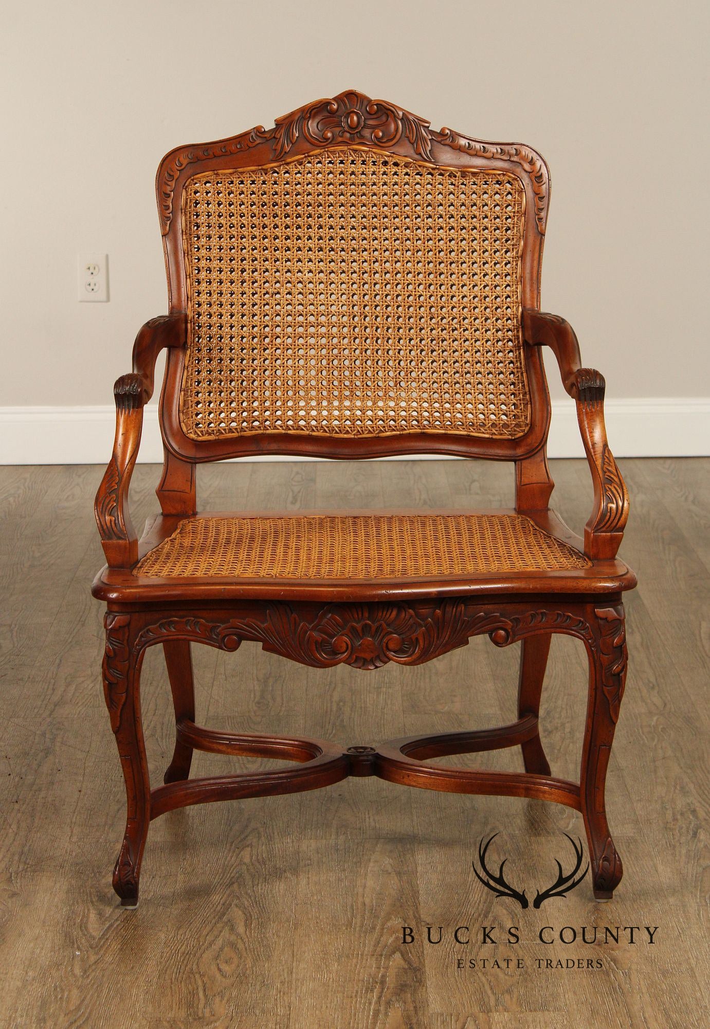 French Louis XV Style Carved Mahogany and Cane Armchair