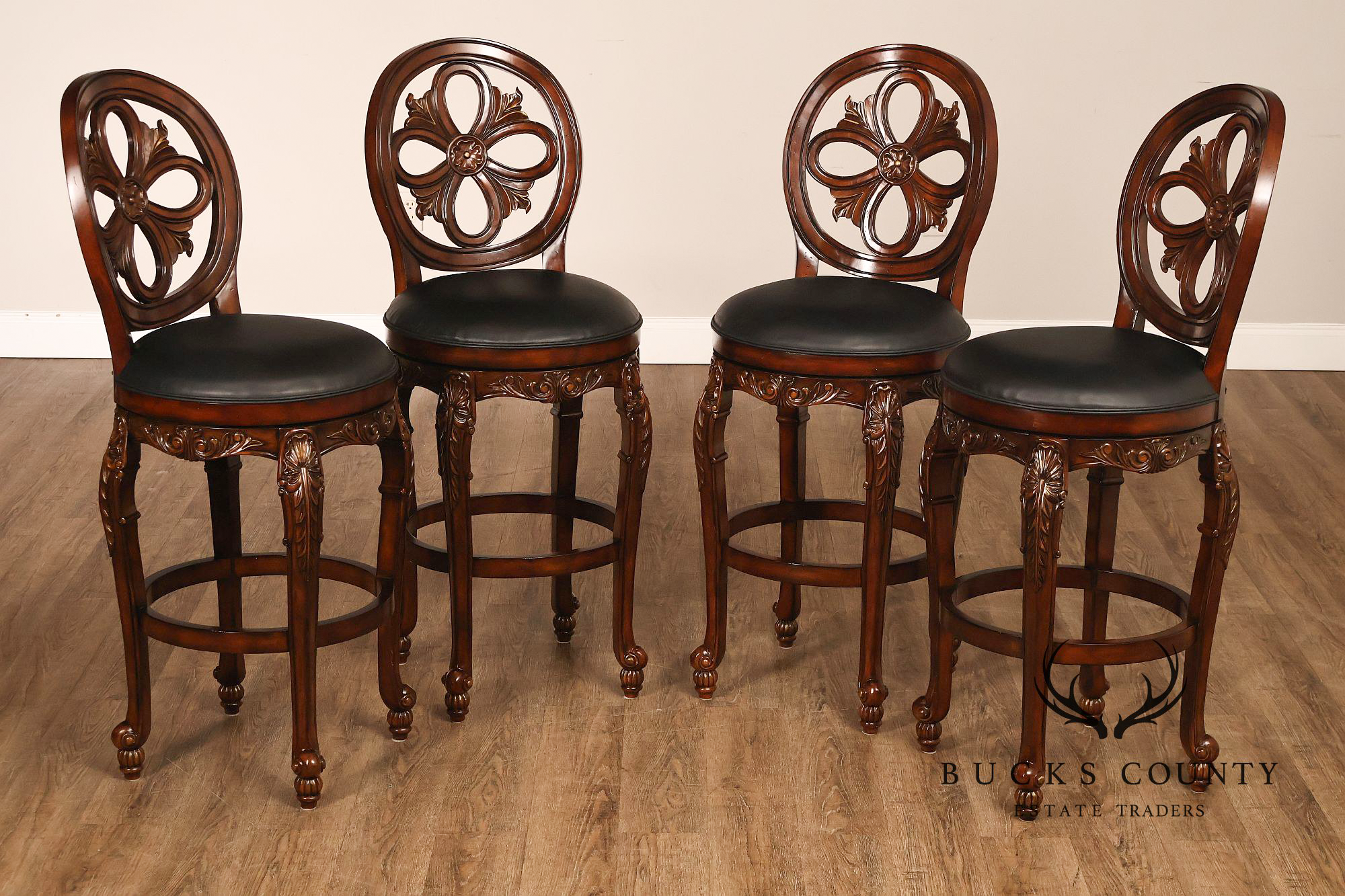 Quality Set Of Four  Carved Mahogany Swivel Bar Stools