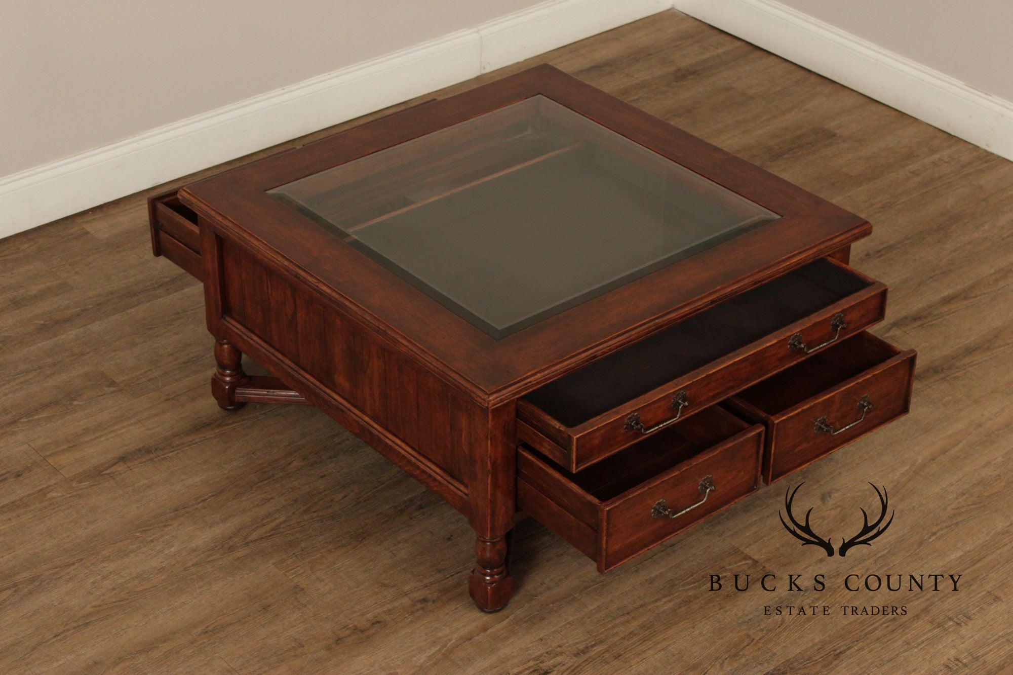 Bausman & Co. Glass Top Storage Coffee Table