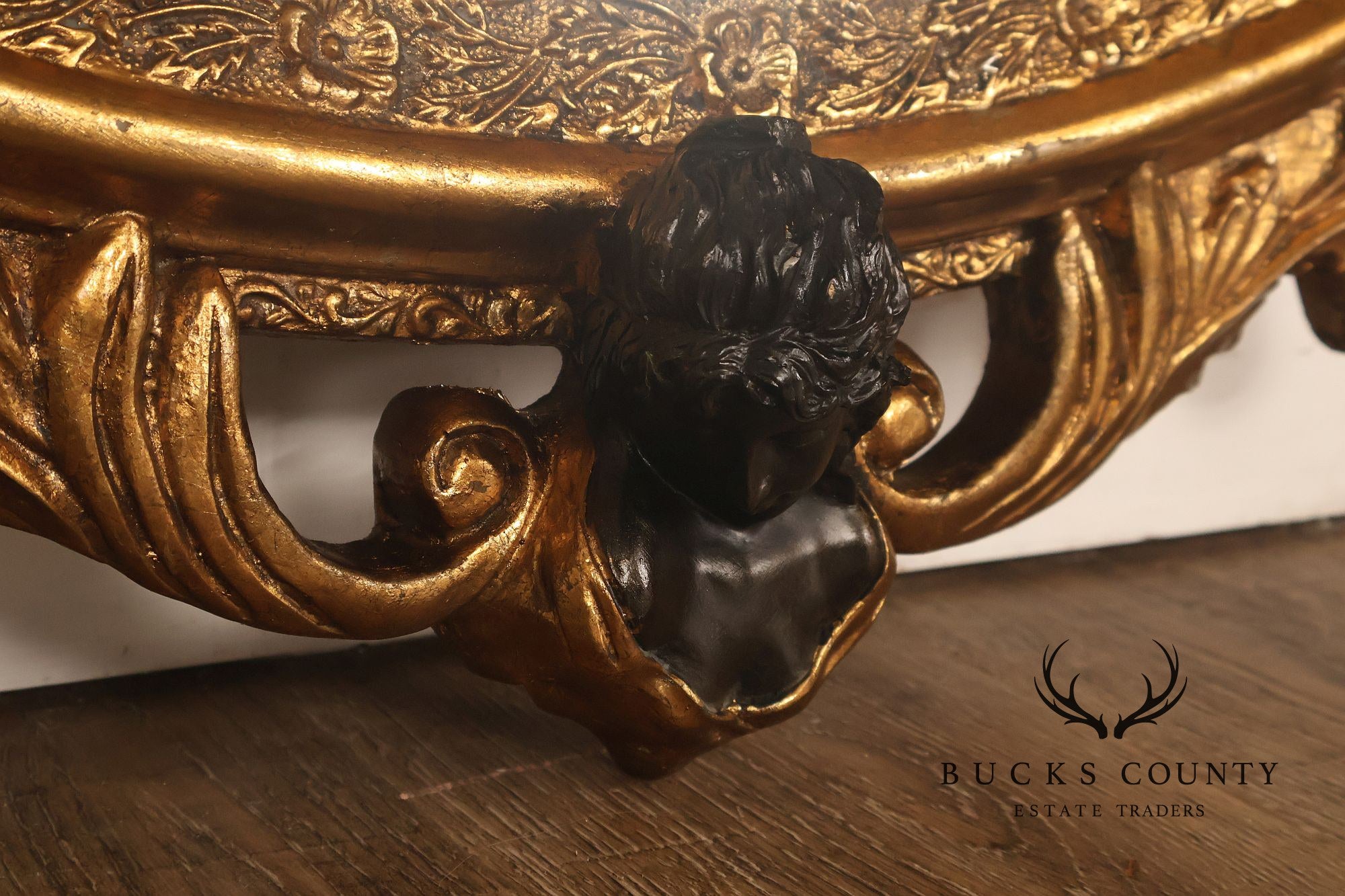 Italian Renaissance Style Cherub Mounted Oval Mirror