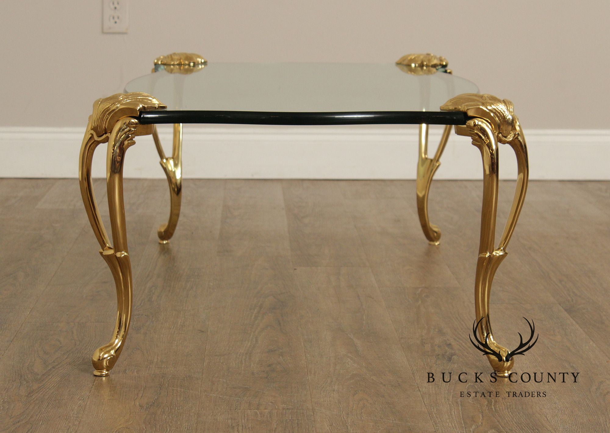 French Style Glass Top Coffee Table With Sculpted Brass Legs