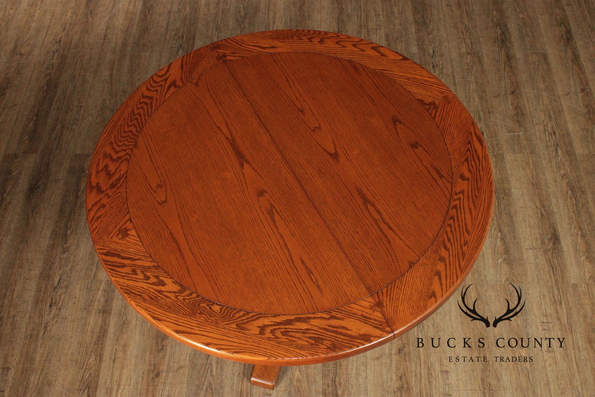 Romweber Round Viking Oak Expandable Dining Table With Four Leaves