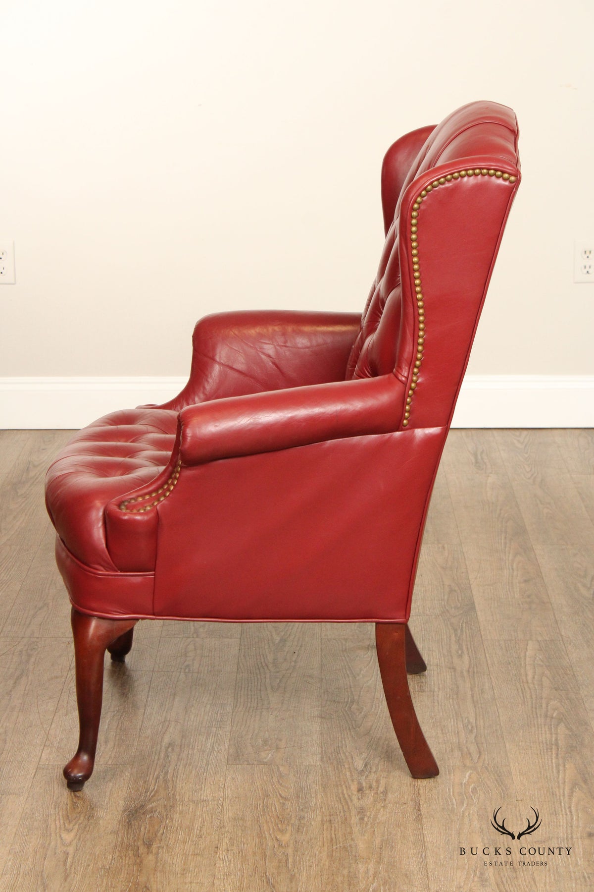 Queen Anne Style Tufted Leather Wing Chair