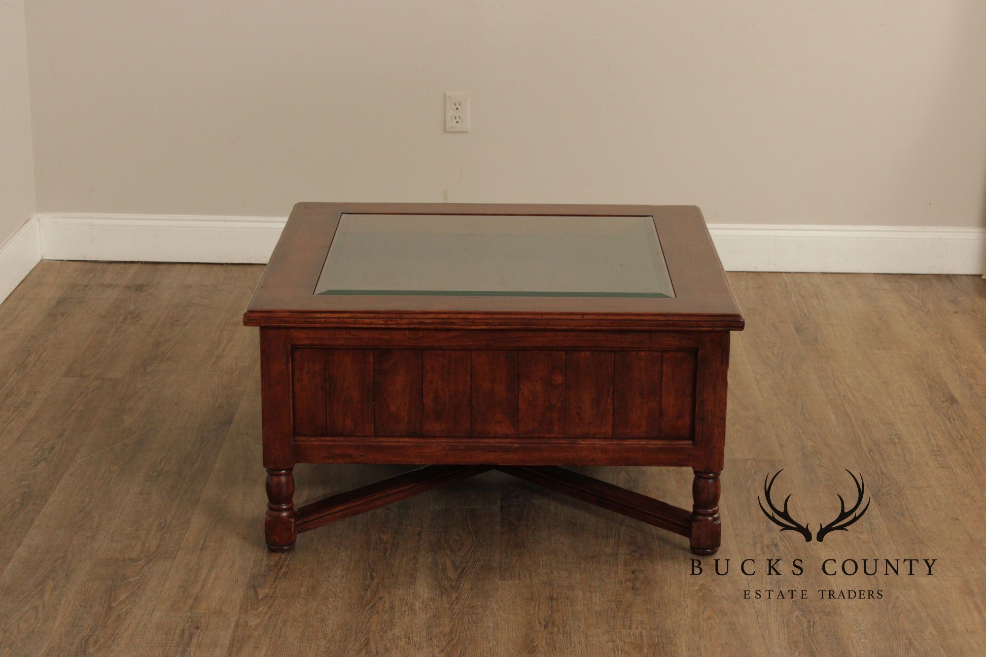 Bausman & Co. Glass Top Storage Coffee Table