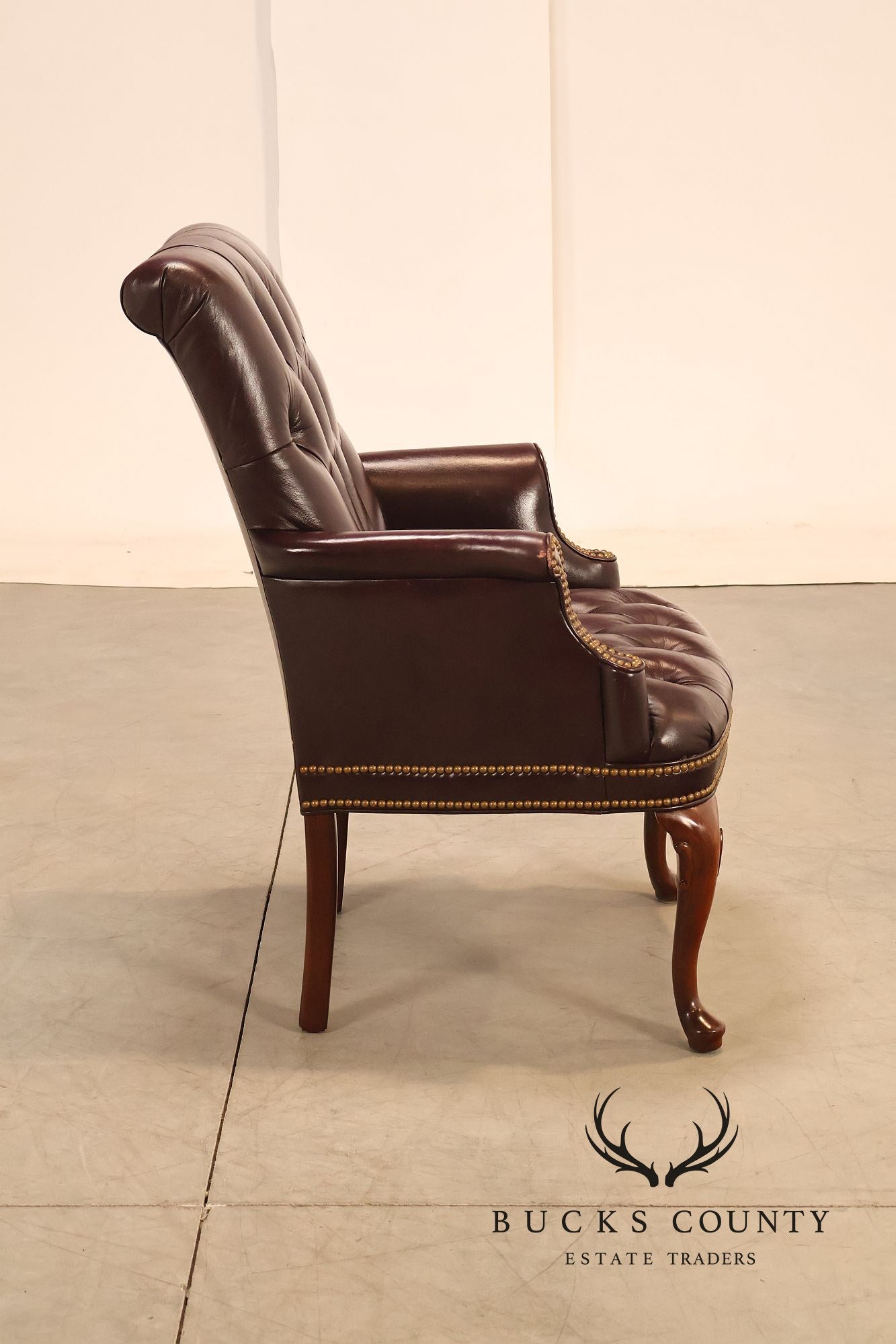 Hancock & Moore Pair of Tufted Leather and Mahogany Armchairs