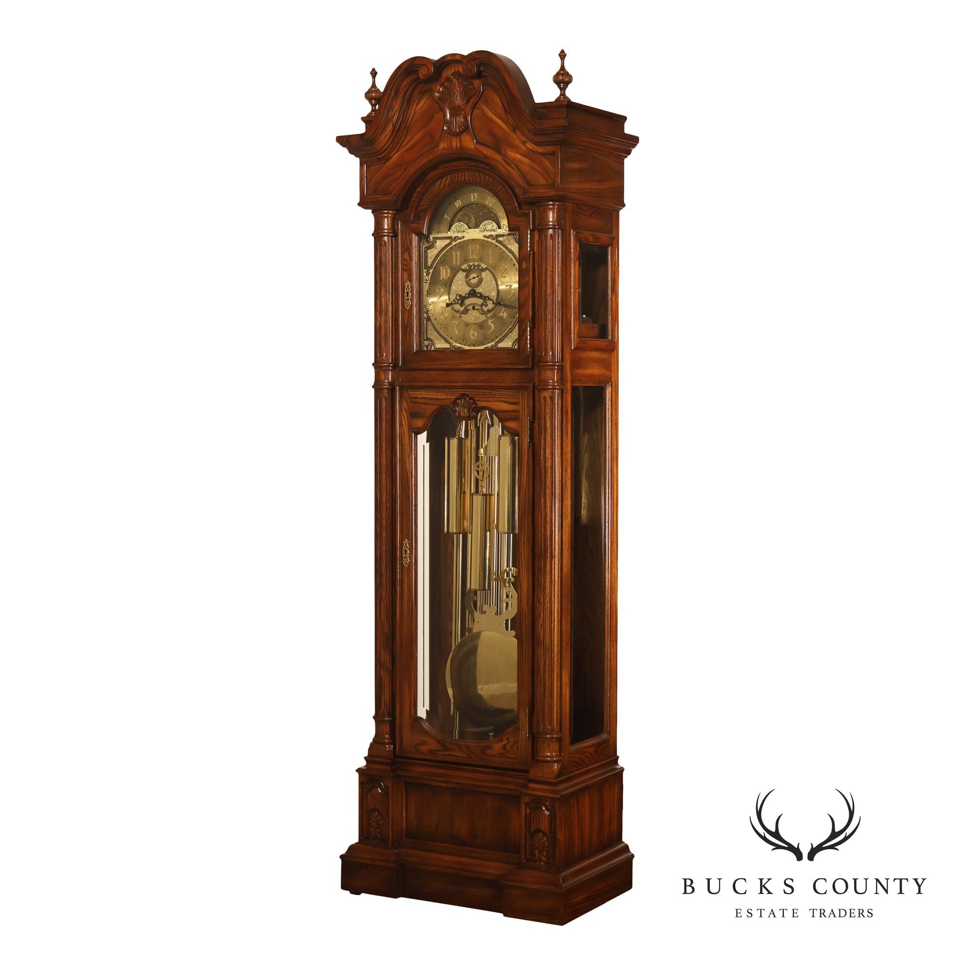 Sligh Traditional Oak Triple Chime Grandfather Clock With Moon Phase Dial