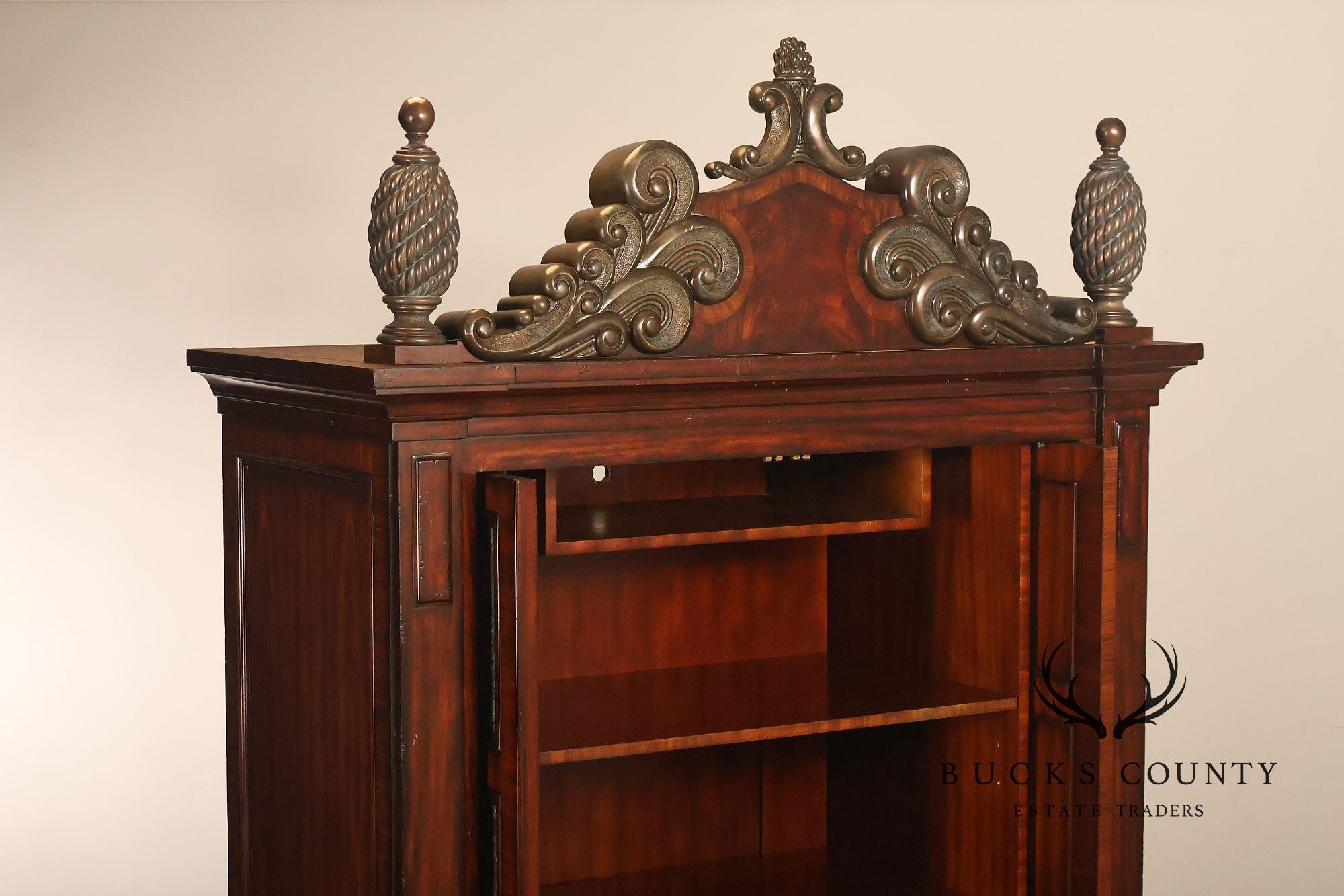 Maitland-Smith Large Mahogany Armoire Cabinet With Bronze Scrollwork Finials And Raised Panel Doors