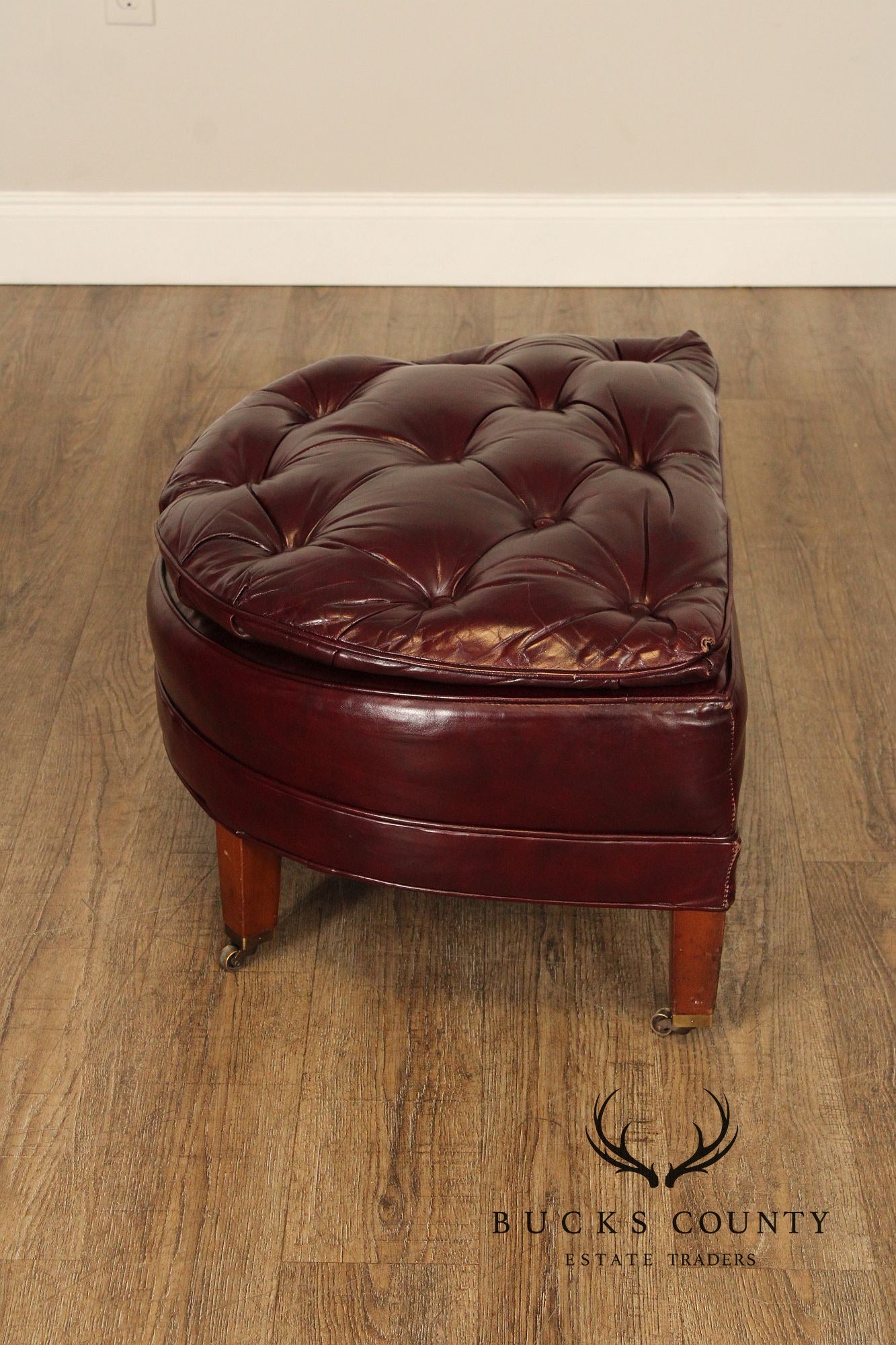 NORTH HICKORY OXBLOOD TUFTED LEATHER CHAIR AND OTTOMAN