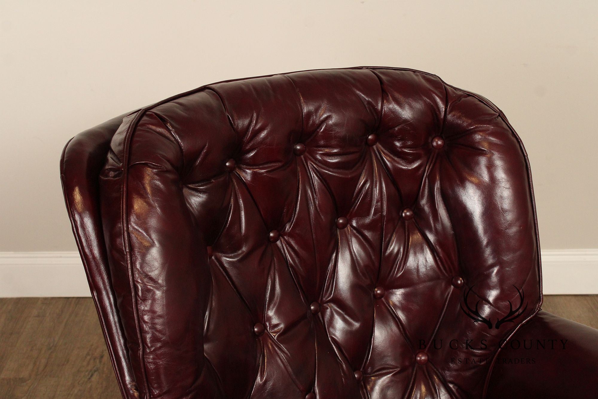 NORTH HICKORY OXBLOOD TUFTED LEATHER CHAIR AND OTTOMAN