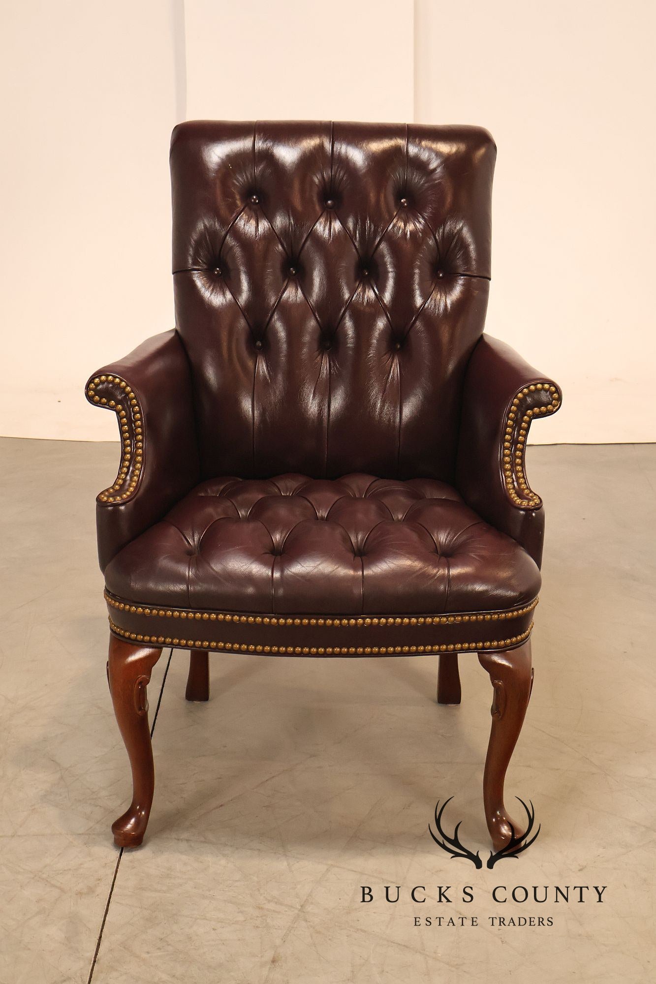 Hancock & Moore Pair of Tufted Leather and Mahogany Armchairs