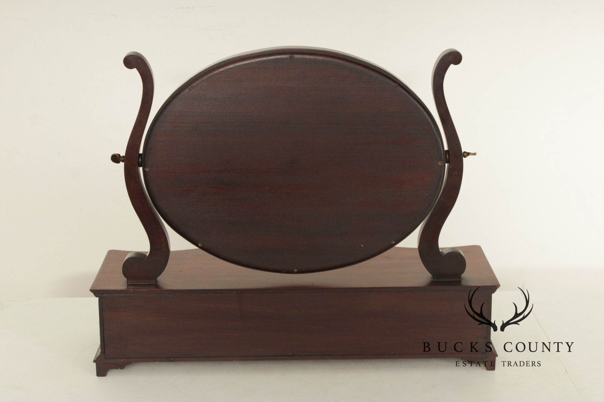 Potthast Bros. Federal Style Mahogany Shaving Mirror With Serpentine Base And Oval Swivel Glass