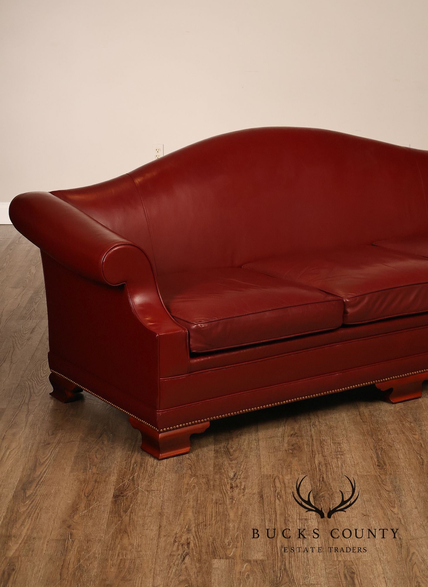 Kindel Vintage Camelback Back Leather Three Cushion Sofa