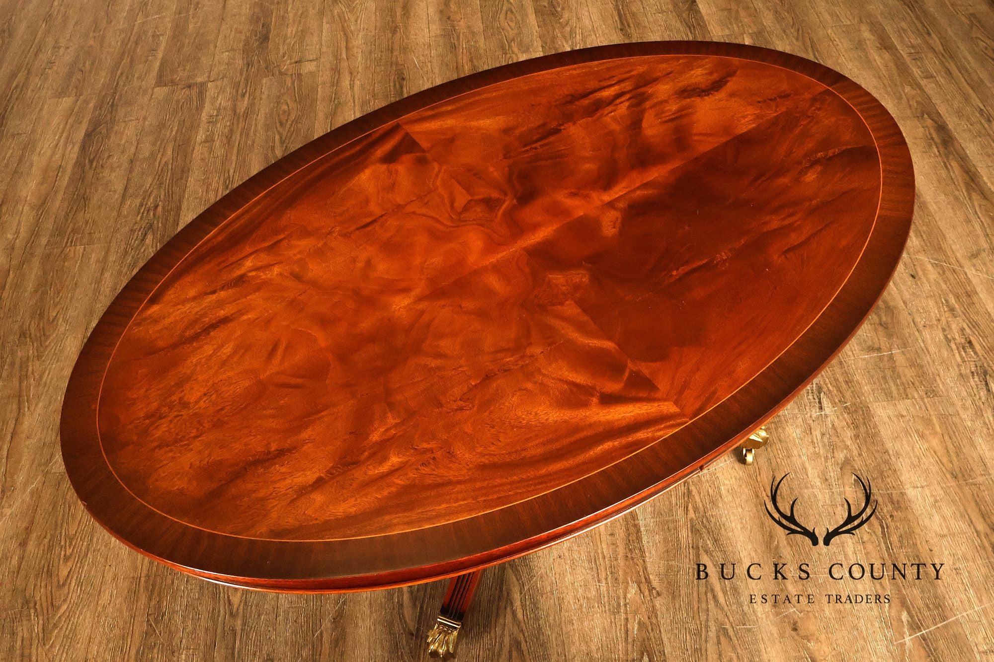Regency Style Flame Mahogany Oval Top Coffee Table