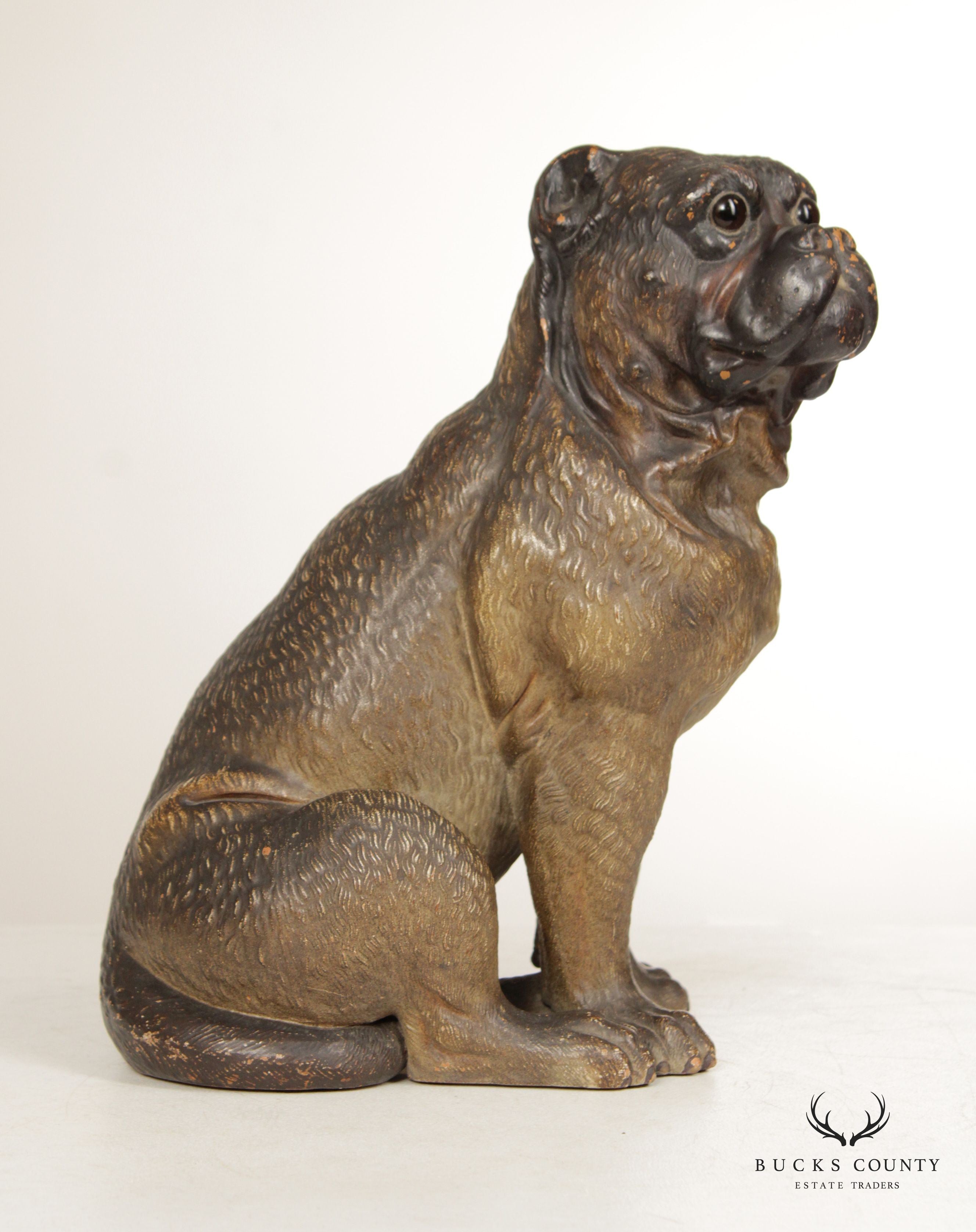 TERRA COTTA SITTING PUG DOG STATUE ATTRIBUTED TO GOLDSCHEIDER
