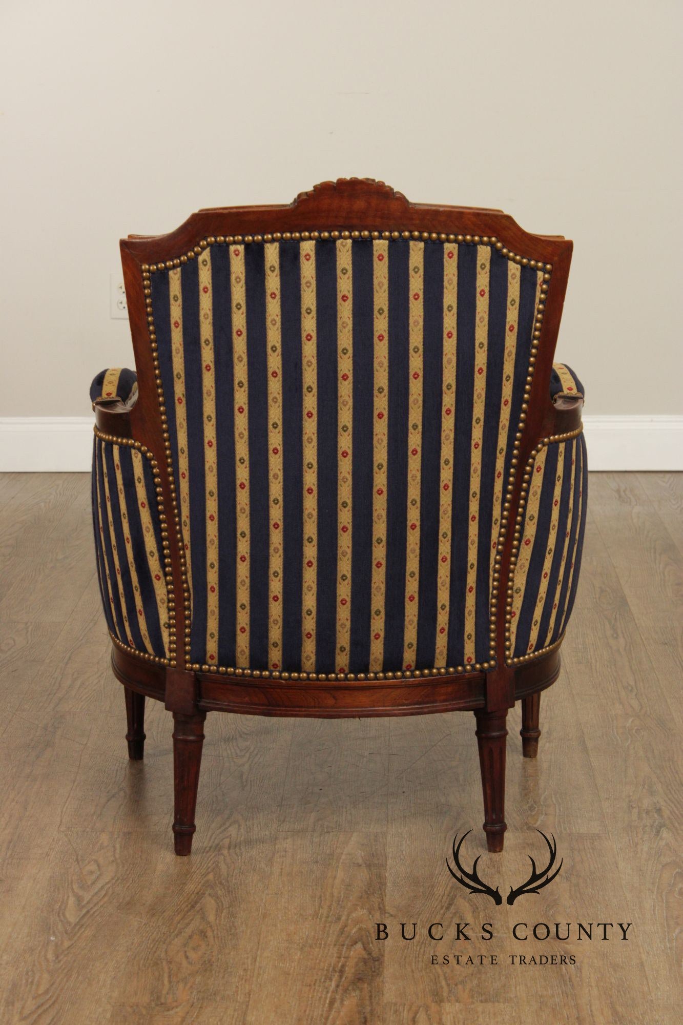 French Louis XVI Style Pair of Carved Walnut Bergere Armchairs