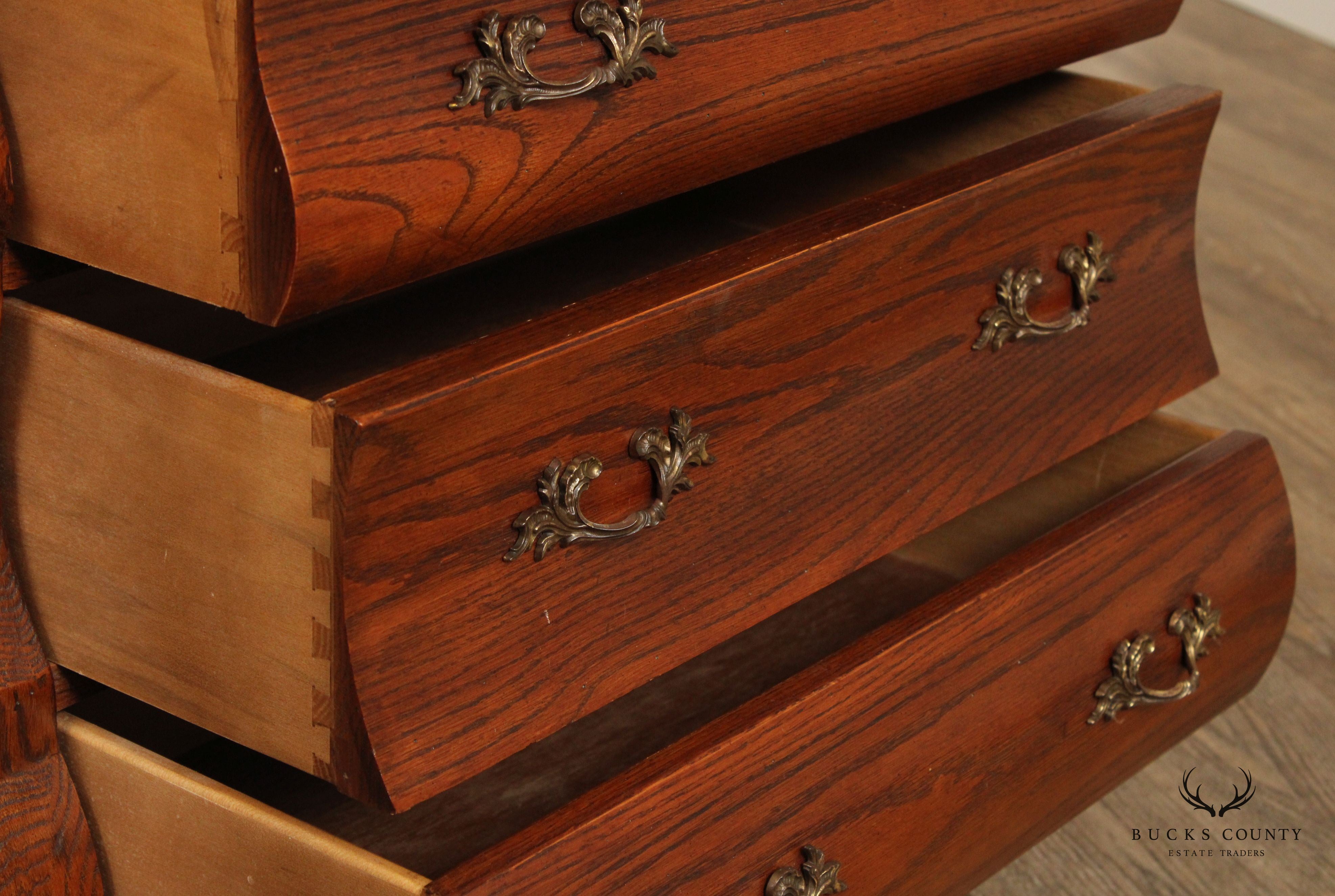 HEKMAN BAROQUE STYLE PAIR OF OAK BOMBE CHEST NIGHTSTANDS