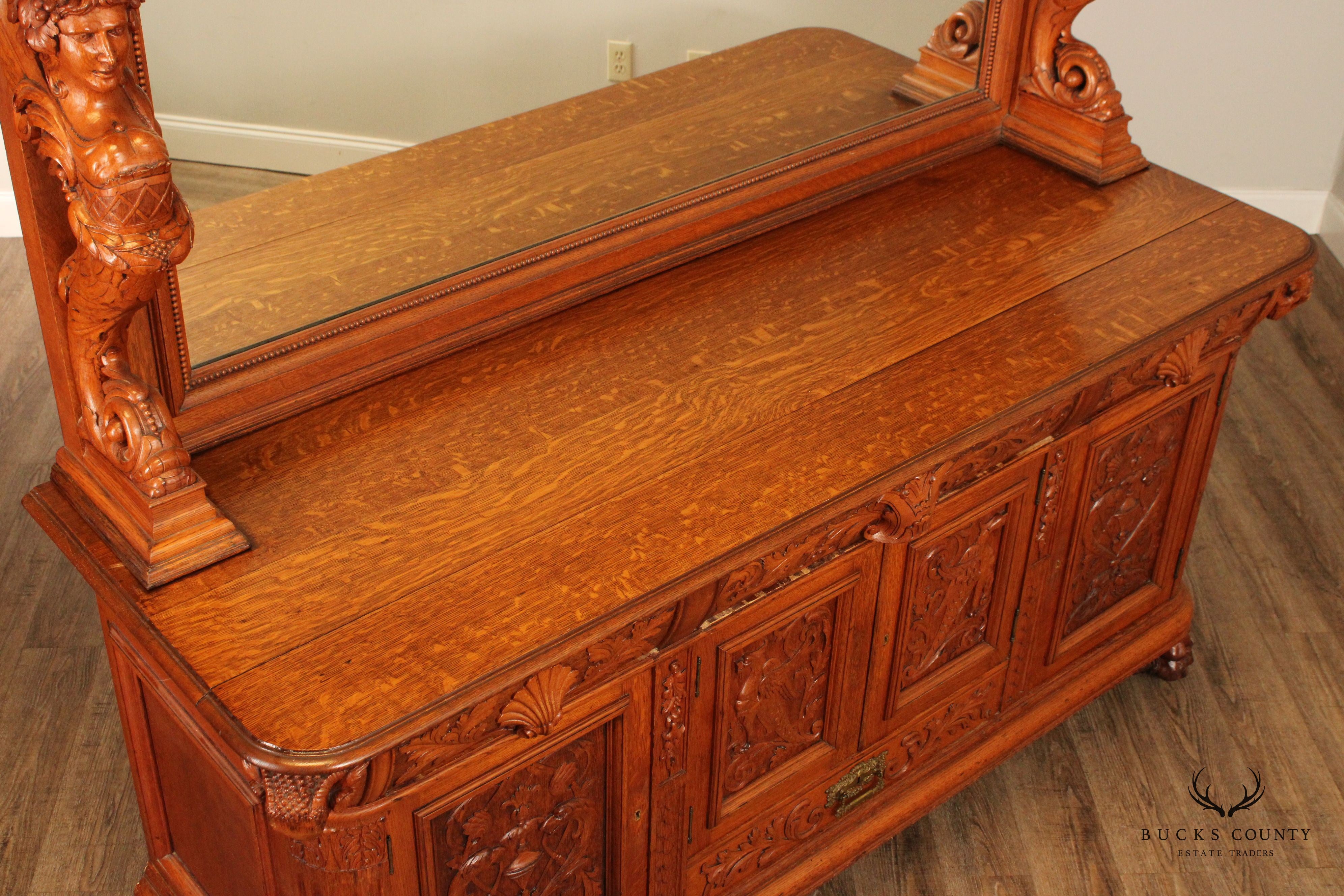 Antique Renaissance Revival Figural Carved Oak Mirrored Sideboard