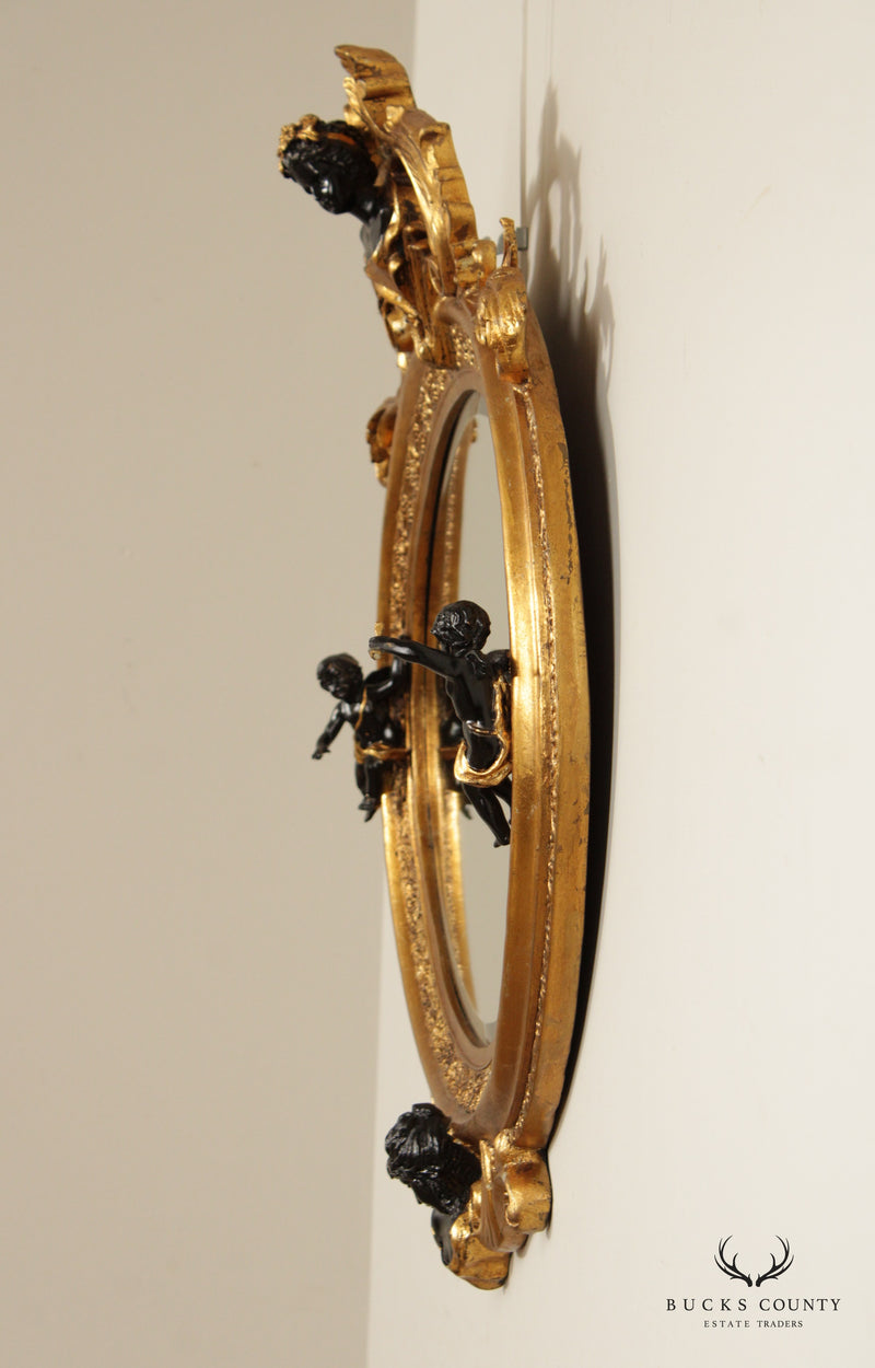 French Rococo Figural Ebonized and Gilted Oval Wall Mirror