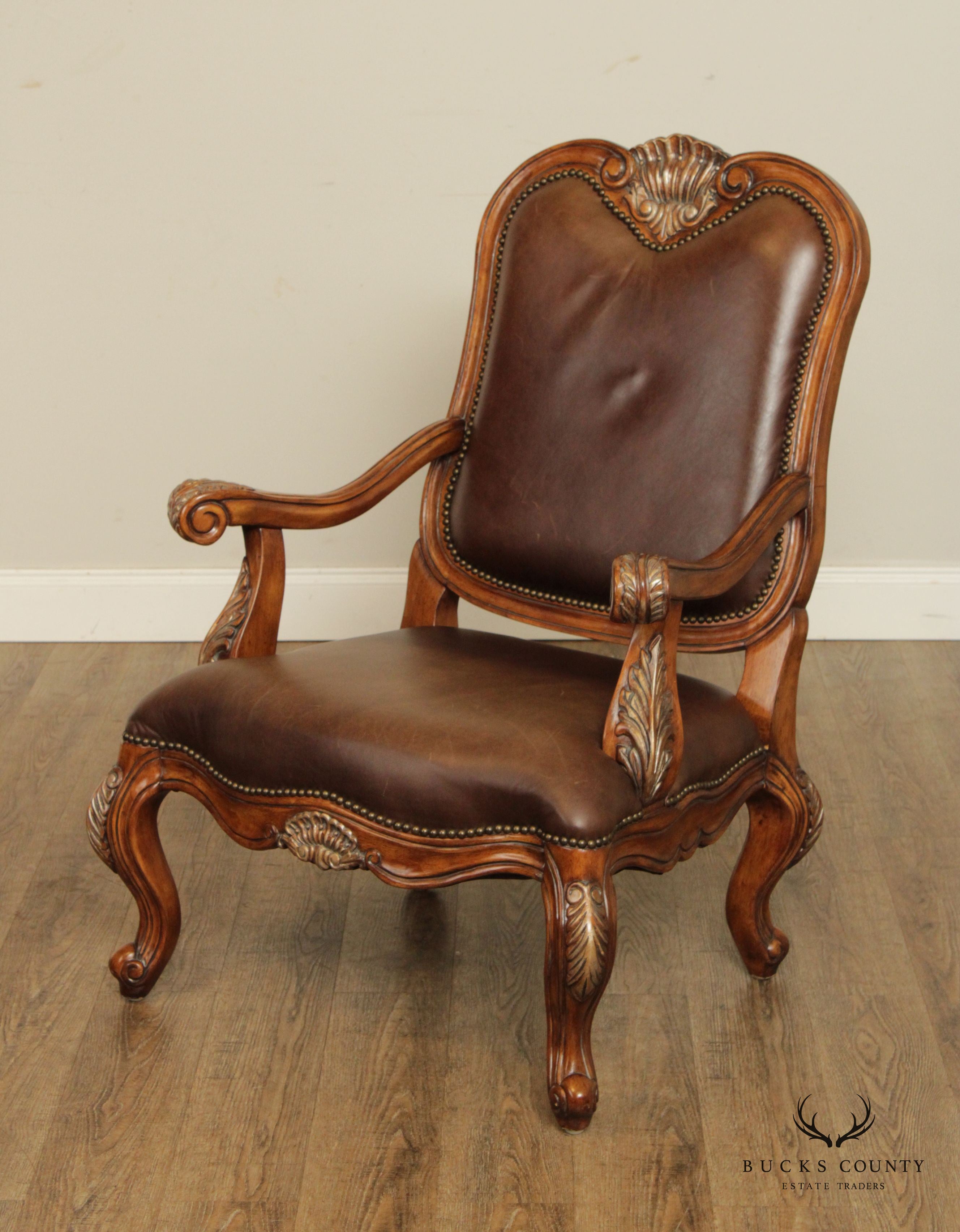 French Provincial Style Pair of Shell-Carved Leather Armchairs and Ottomans