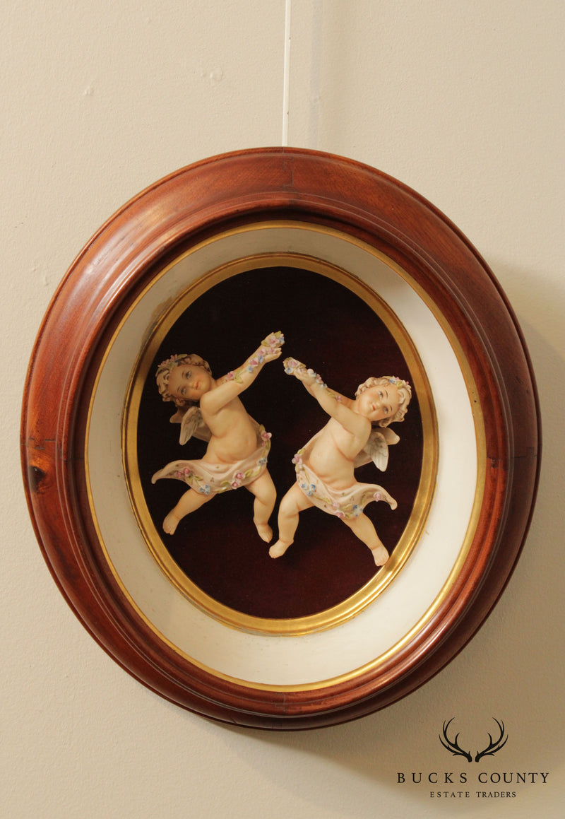 Porcelain Cherub Oval Framed Figurines