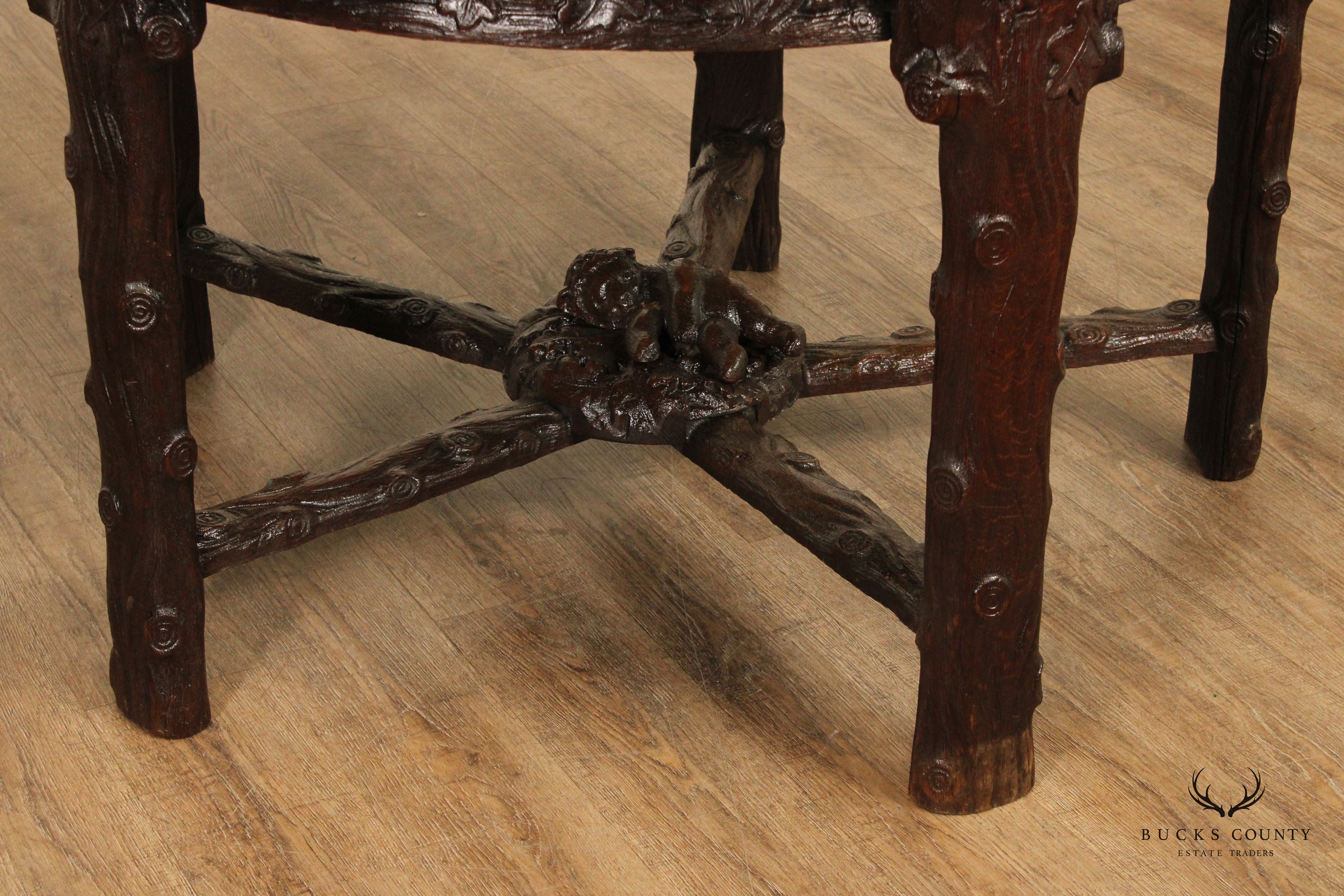 Antique American Black Forest Style Carved Oak Round Dining Table