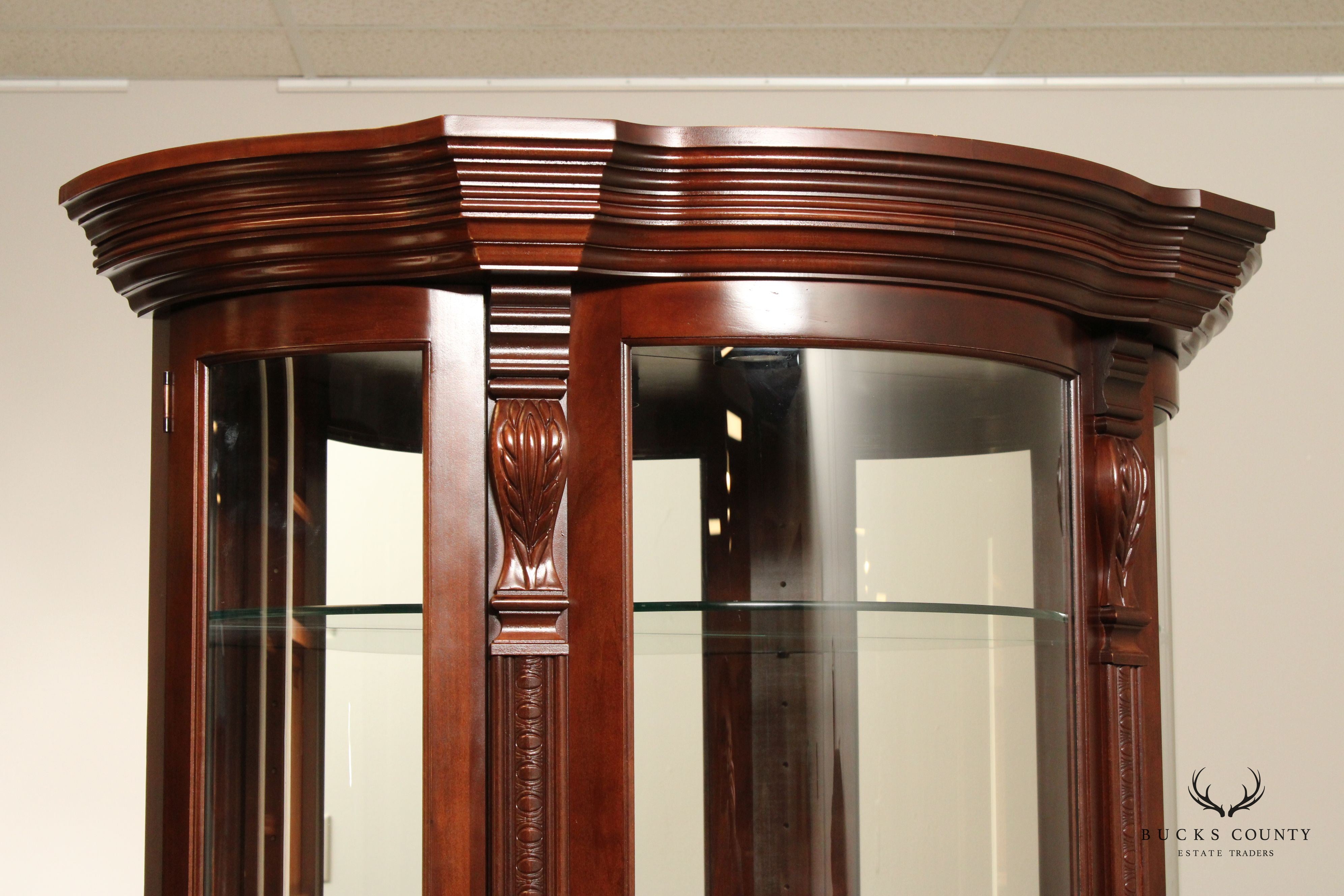 Philip Reinisch Company Bow Front Illuminated Curio Cabinet