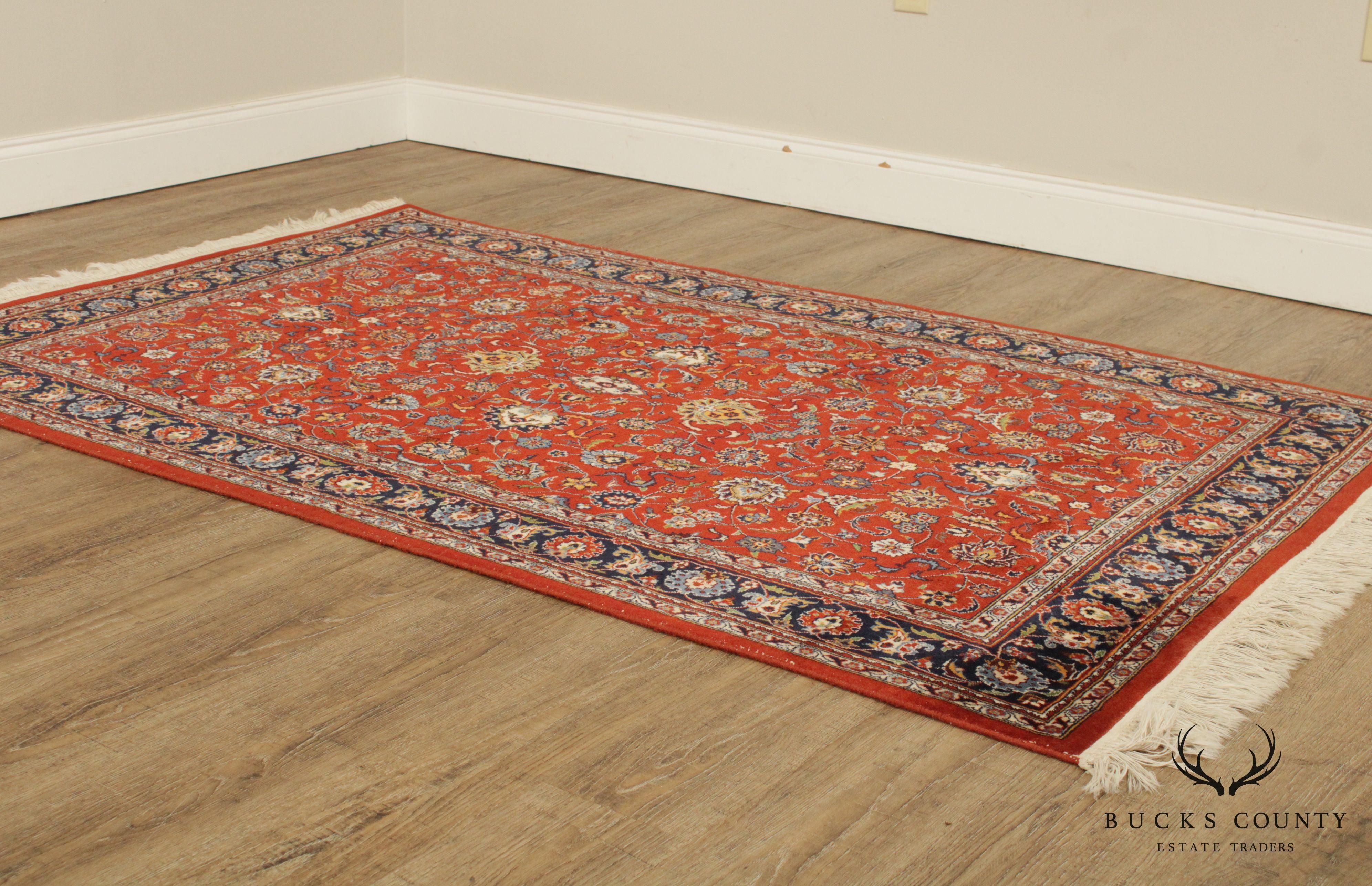 Vintage Sarouk 6'9 inch x 4'1 inch Handwoven Wool Rug