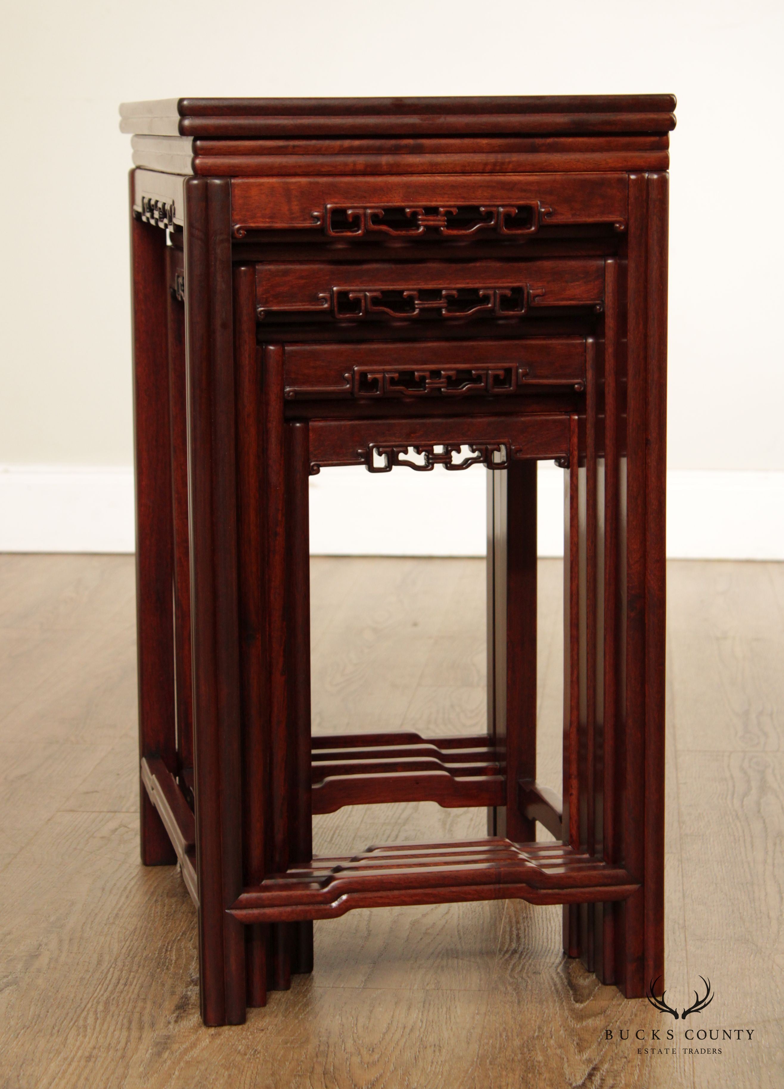 Chinese Set of Four Carved Hardwood Nesting Tables