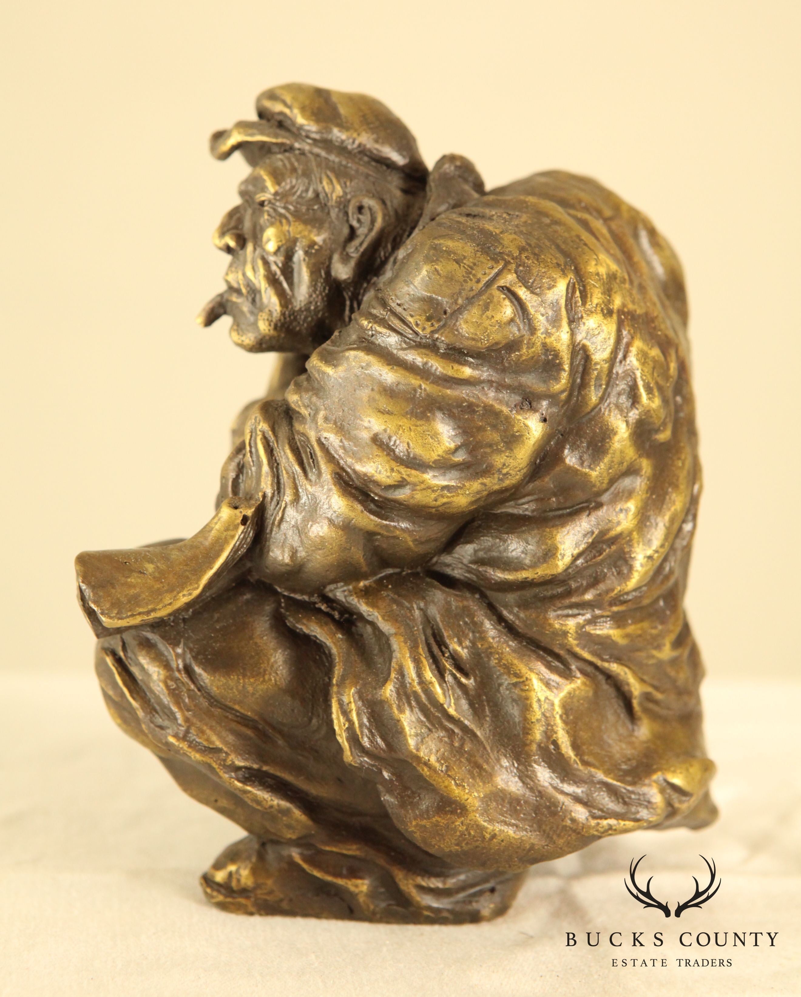 Atlie Bronze Figure of an Older Man Crouching, Reading, Striking Match (A)