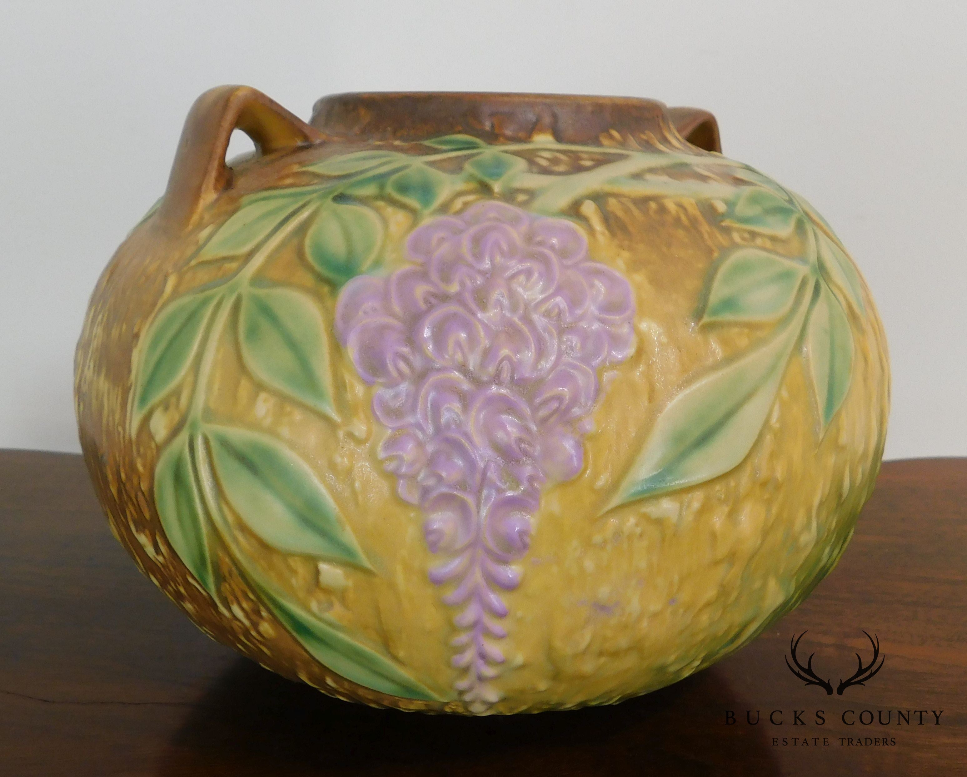 Roseville "Wisteria" Double-Handled Bulbous Vase in Tan