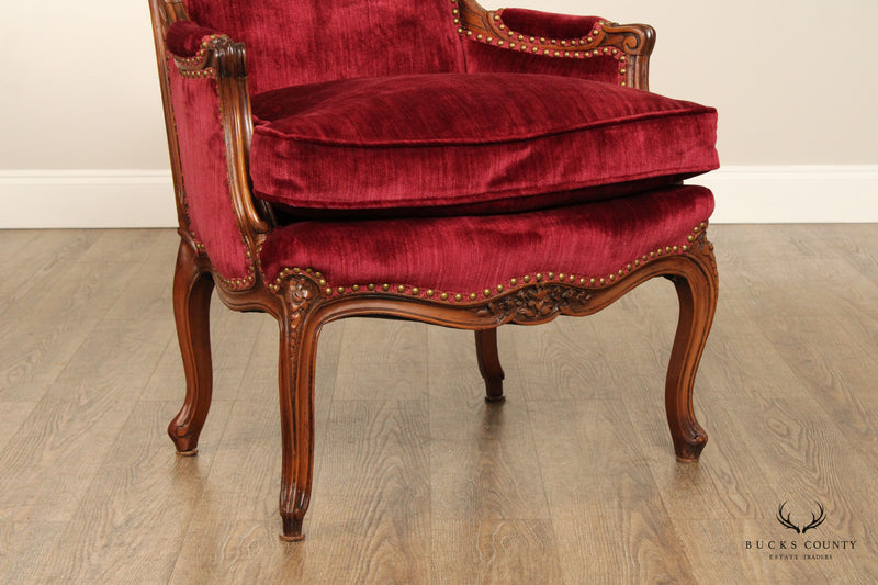 FRENCH LOUIS XV STYLE CARVED WALNUT UPHOLSTERED BERGERE ARMCHAIR