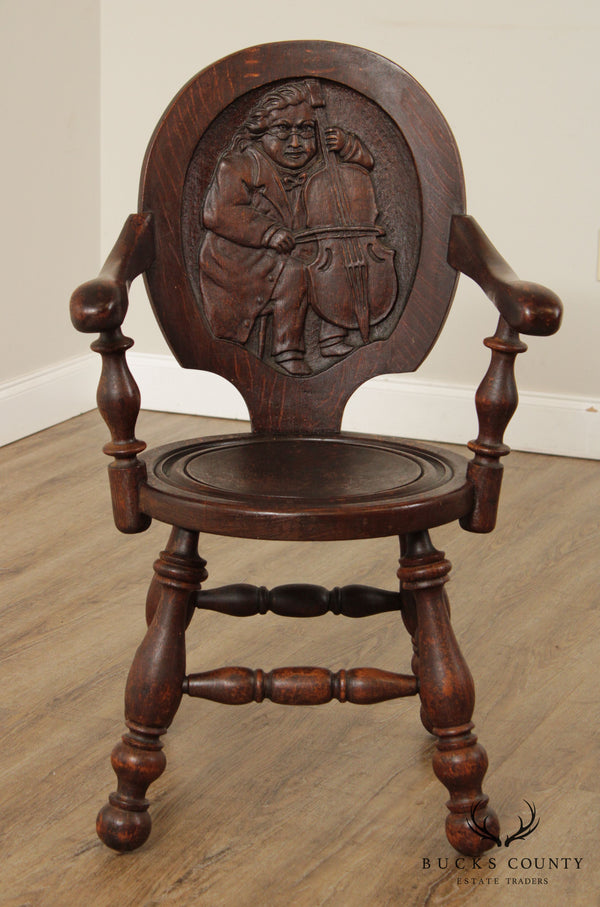 Antique Carved Oak Armchair with Man Playing Cello