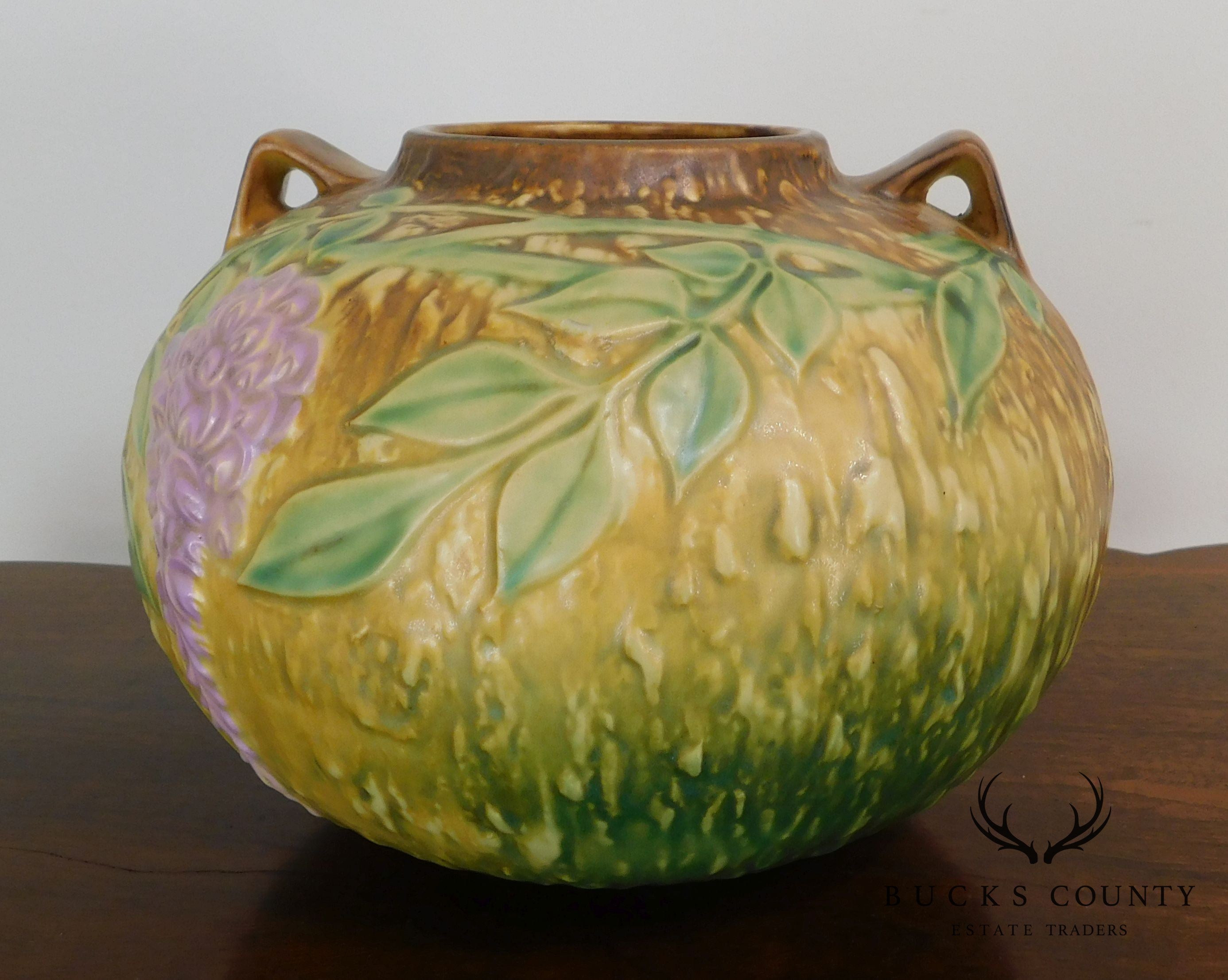 Roseville "Wisteria" Double-Handled Bulbous Vase in Tan