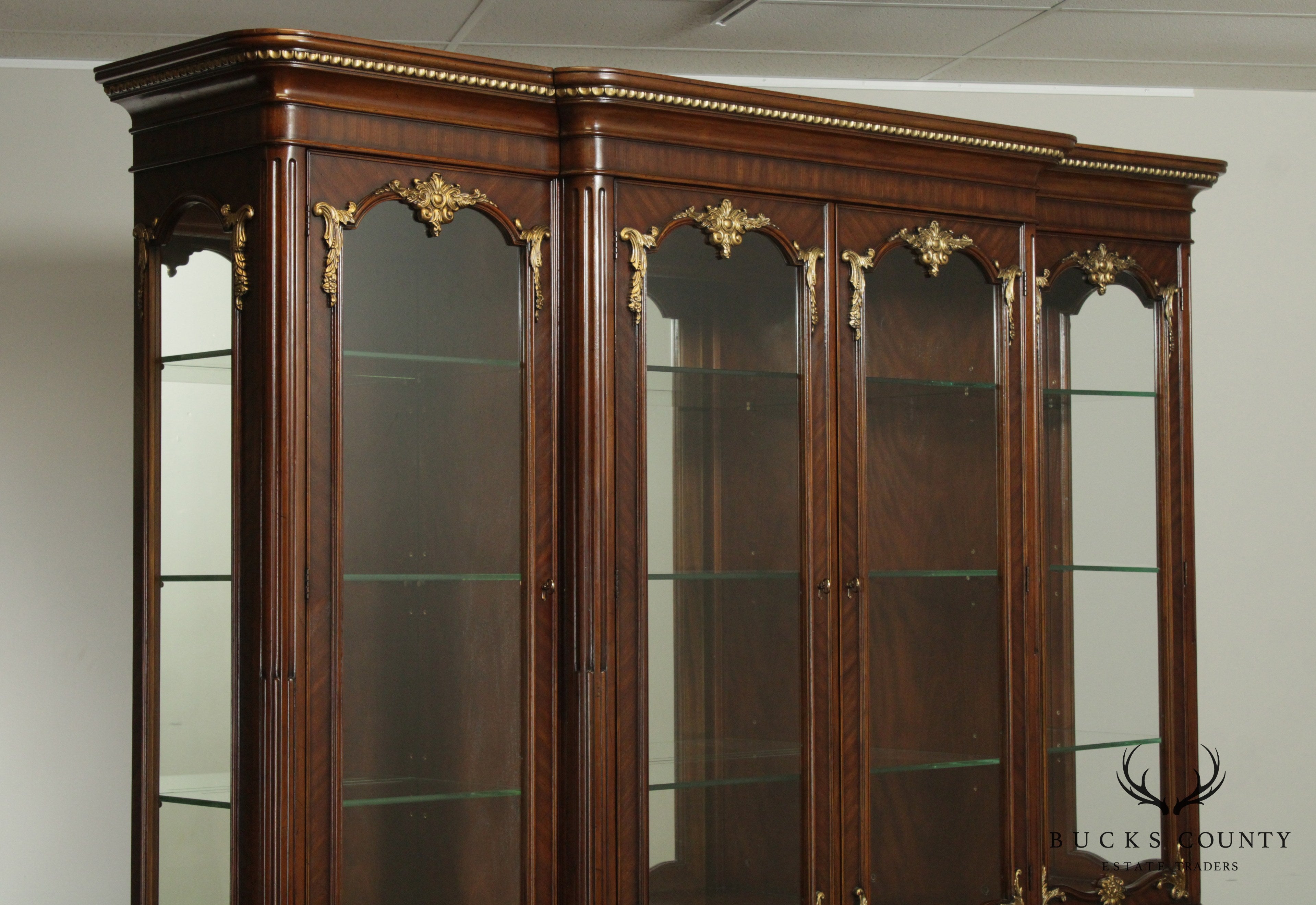 Monumental French Louis XVI Style Mahogany, Partial Gilt Breakfront