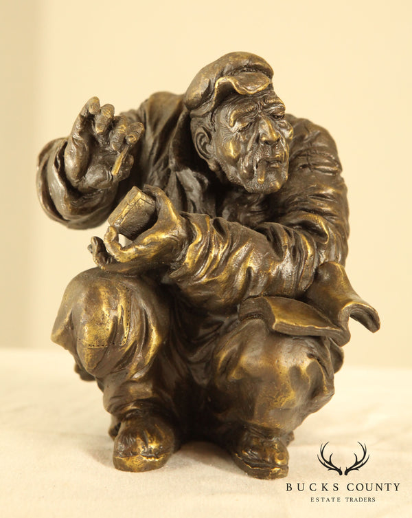 Atlie Bronze Figure of an Older Man Crouching, Reading, Striking Match (A)