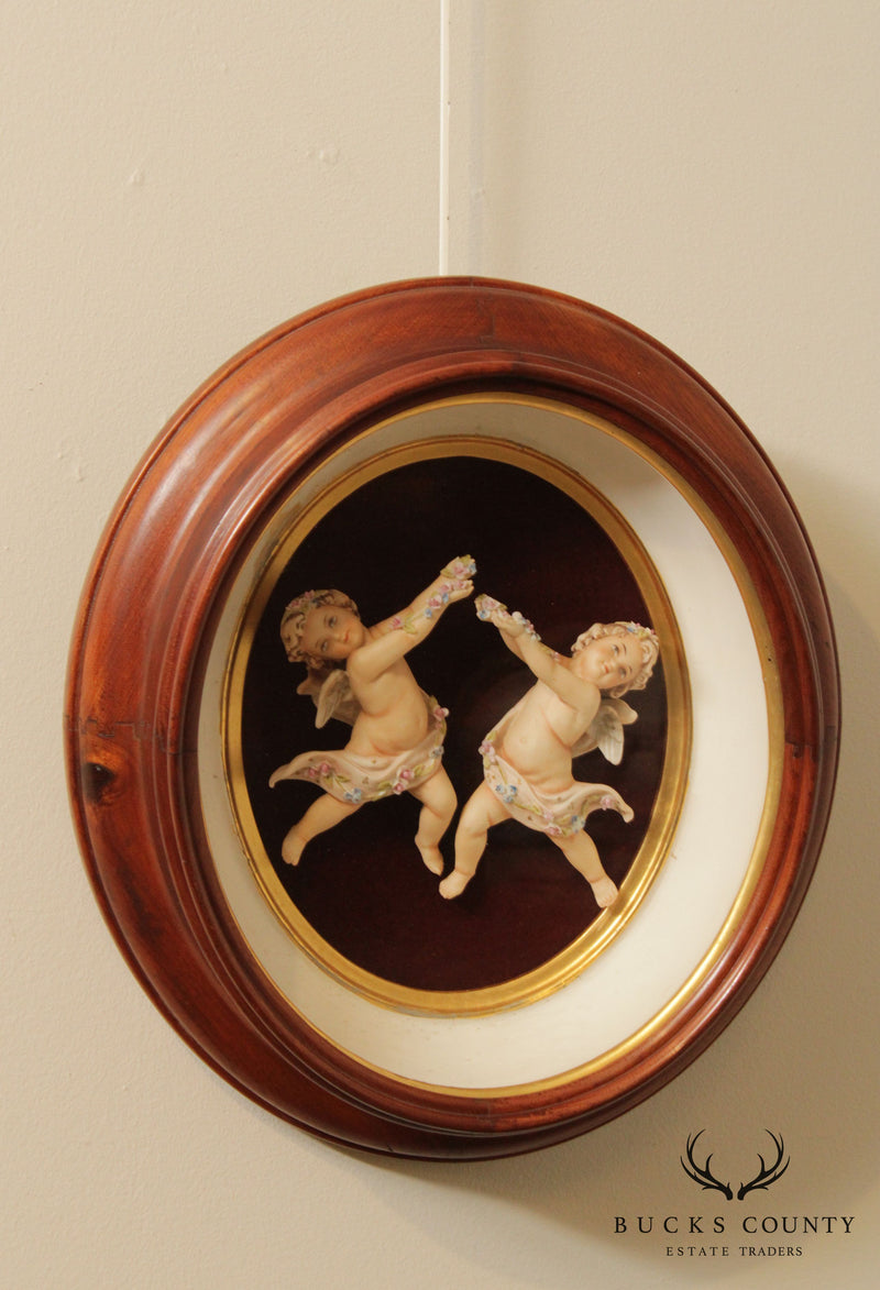 Porcelain Cherub Oval Framed Figurines