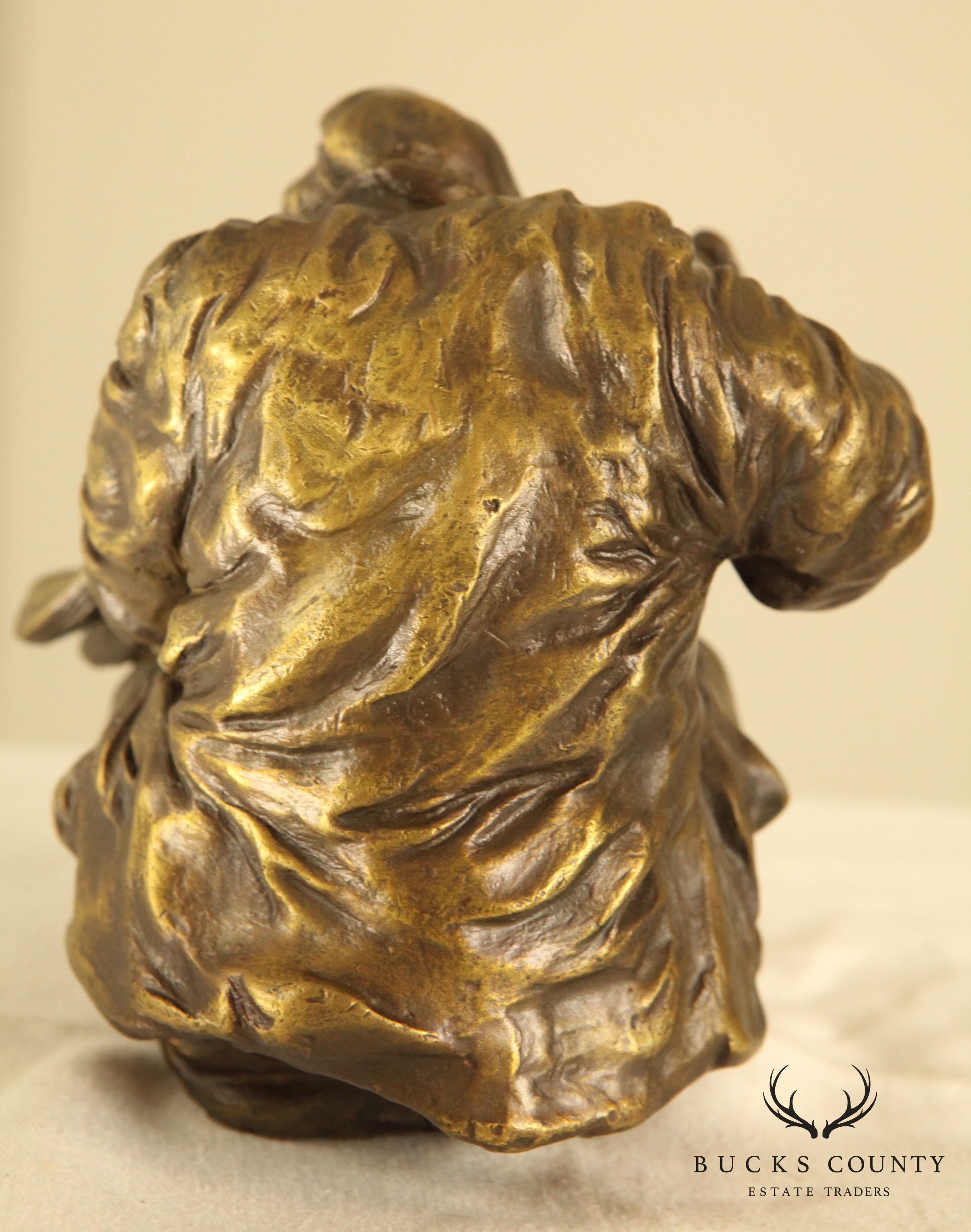 Atlie Bronze Figure of an Older Man Crouching, Reading, Striking Match