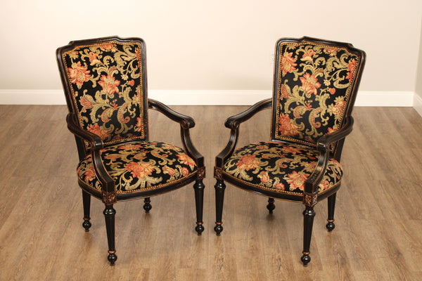 French Louis XVI Style Pair of Ebonized and Partial Gilt Armchairs