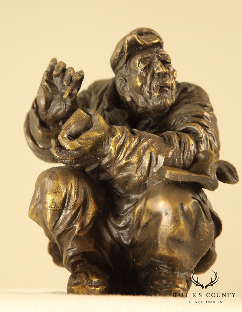 Atlie Bronze Figure of an Older Man Crouching, Reading, Striking Match (A)