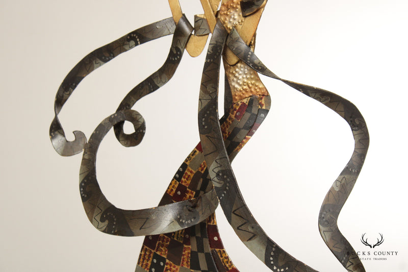 CONTEMPORARY METAL SCULPTURE OF WOMAN WITH RIBBONS