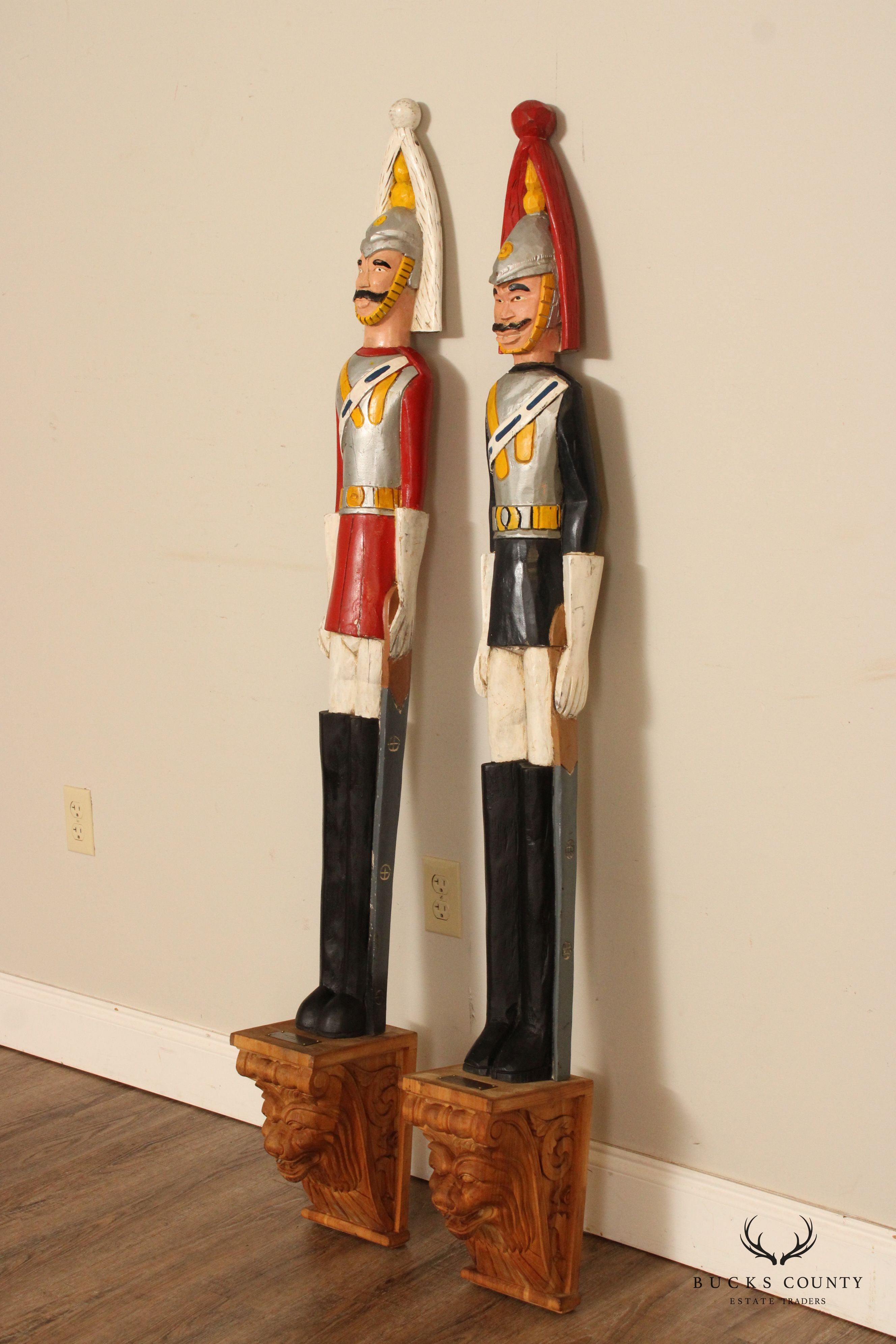 VINTAGE PAIR OF HAND CARVED BRITISH ROYAL HOUSE GUARDS STATUES