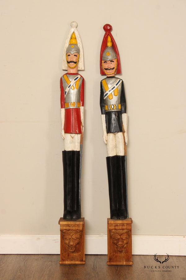 VINTAGE PAIR OF HAND CARVED BRITISH ROYAL HOUSE GUARDS STATUES