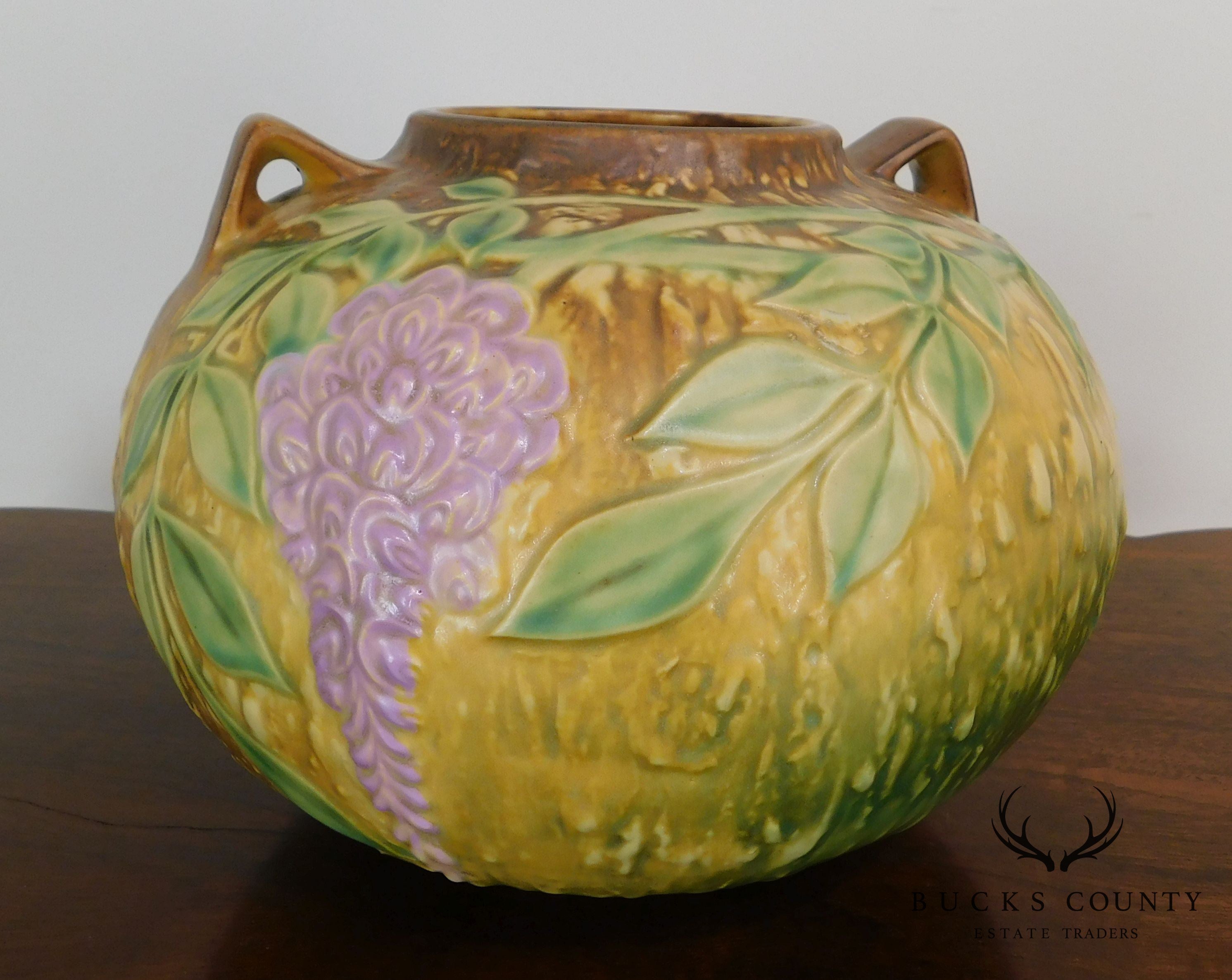 Roseville "Wisteria" Double-Handled Bulbous Vase in Tan