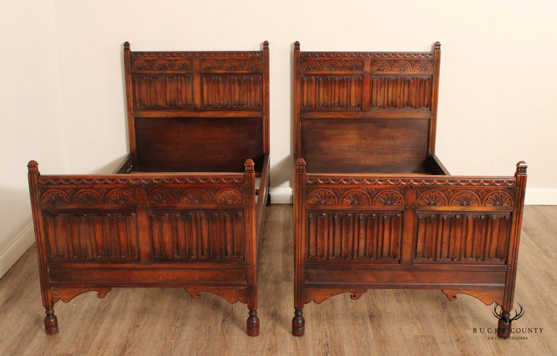 Kittinger Tudor Style Pair of Carved Walnut Twin Beds