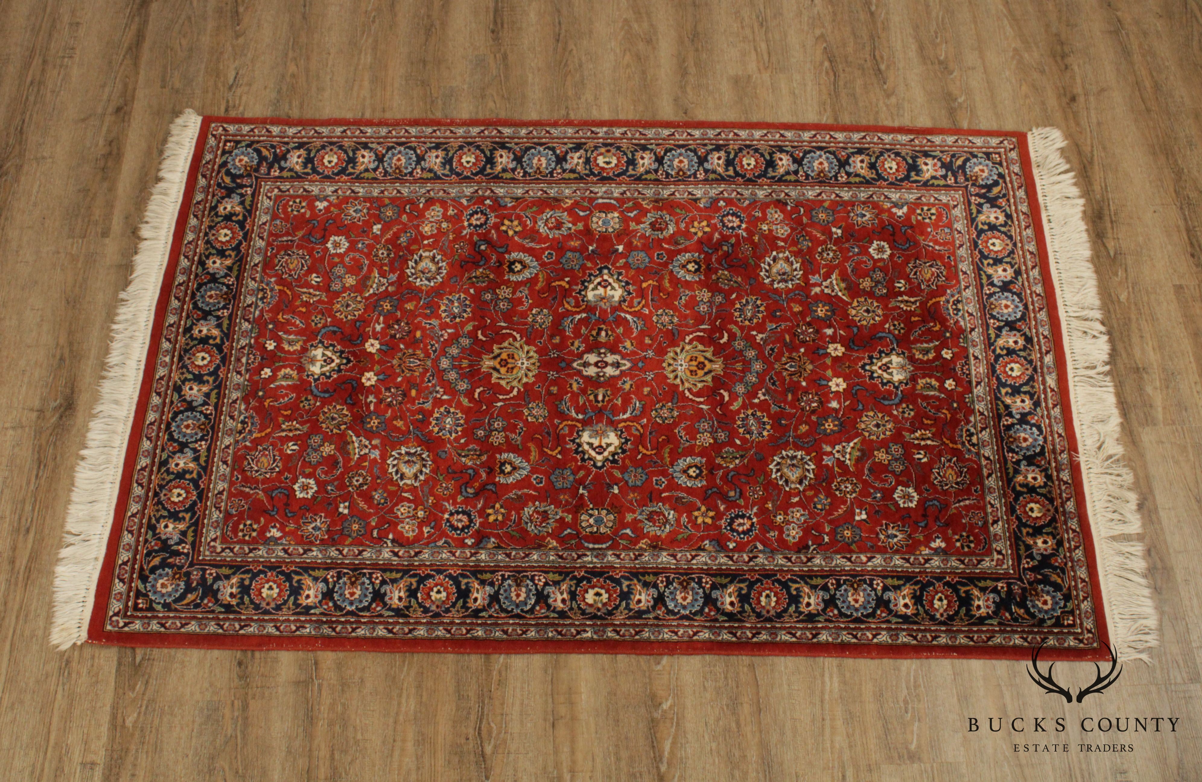 Vintage Sarouk 6'9 inch x 4'1 inch Handwoven Wool Rug