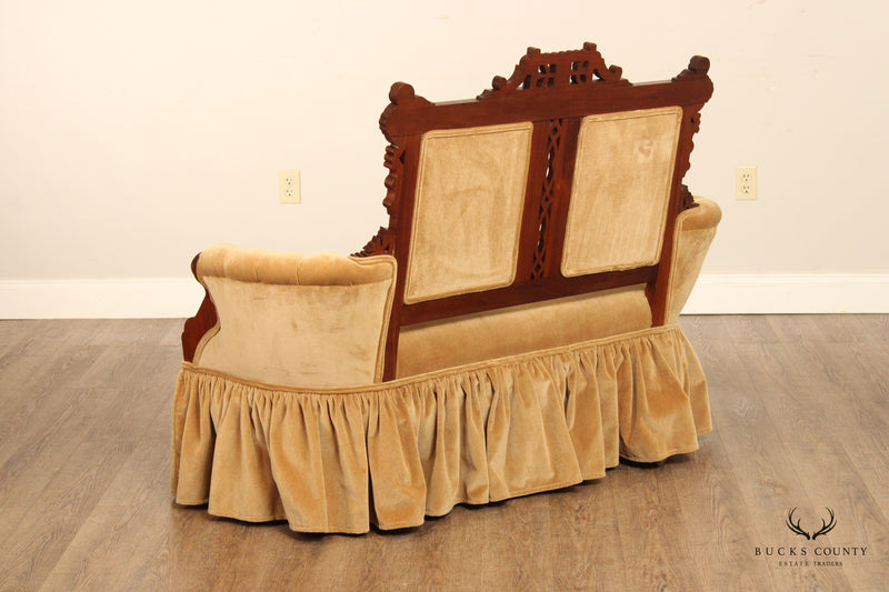 Victorian Eastlake Antique Carved Walnut and Tufted Loveseat Sofa