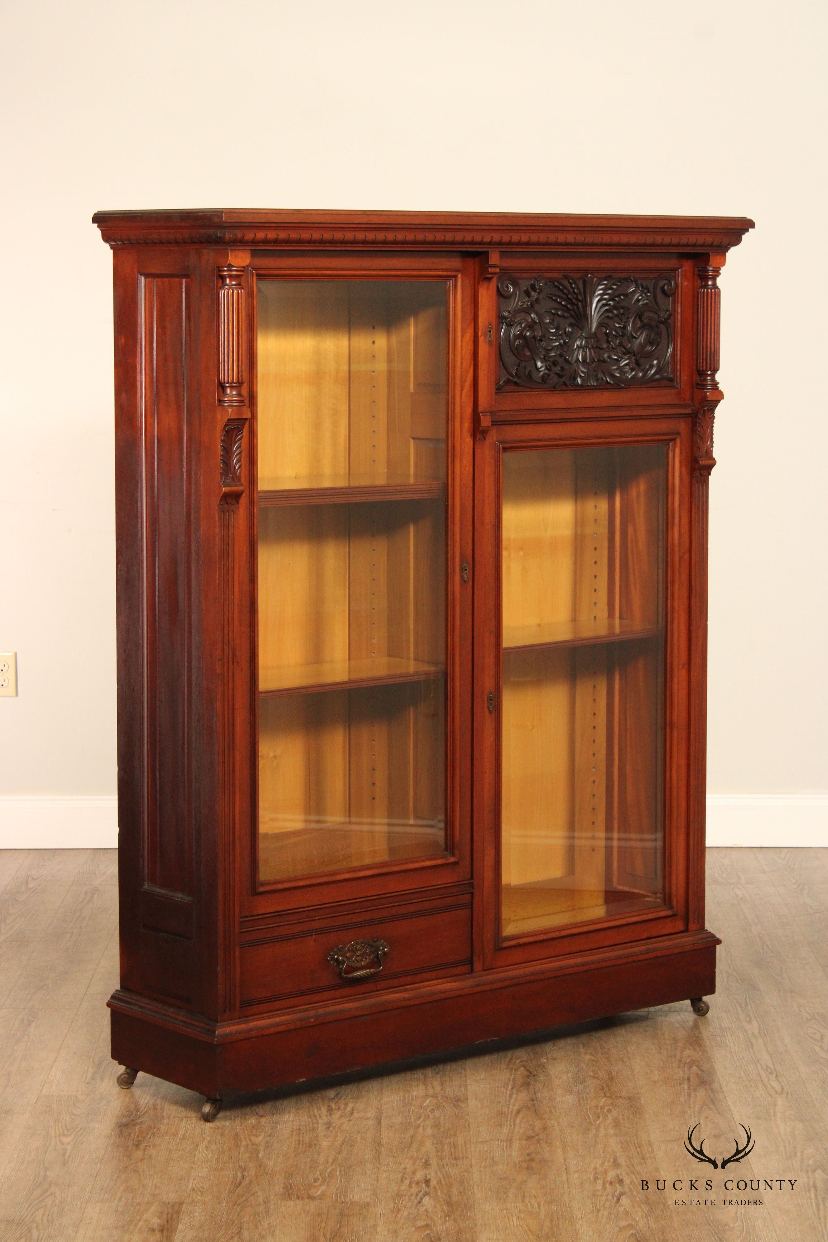 Antique Renaissance Revival Carved Mahogany Bookcase